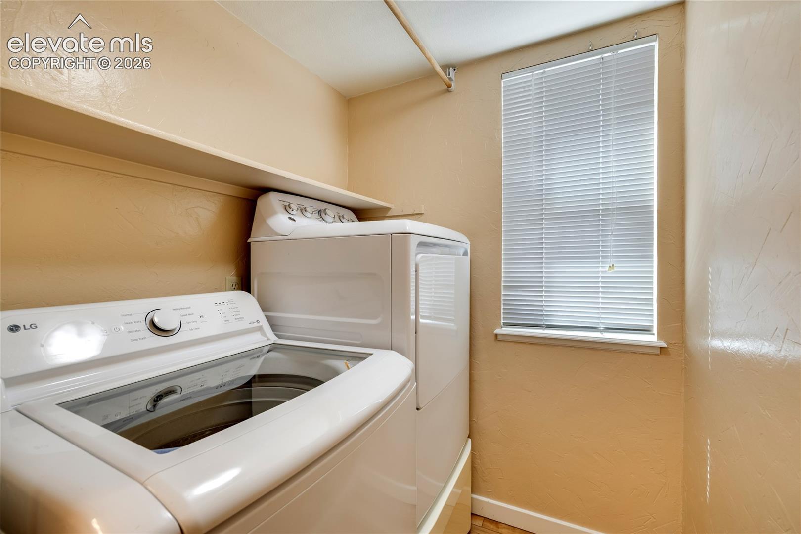 Main level laundry space, washer and dryer included