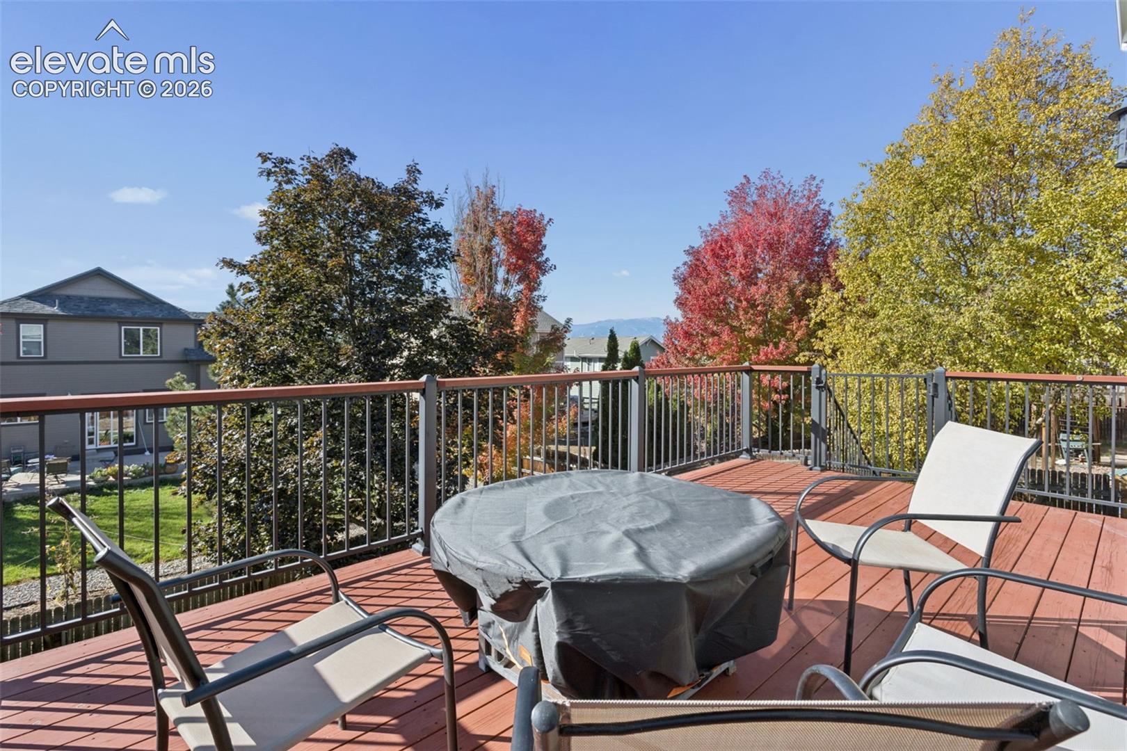 Rear deck with mountain views