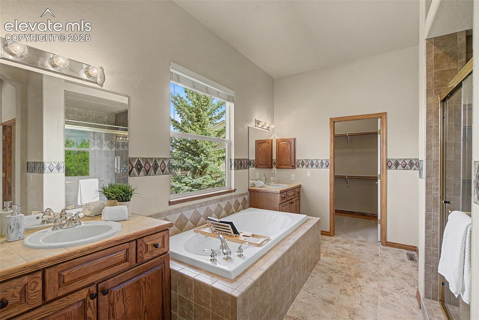 5-piece primary bath with dual sinks, large shower and tub