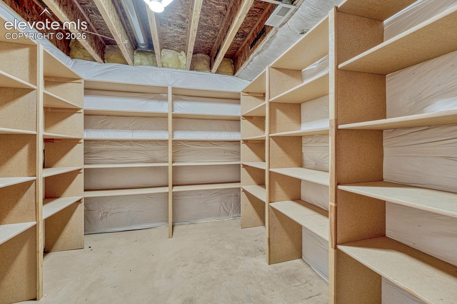 Basement Storage Room with built-in shelves.