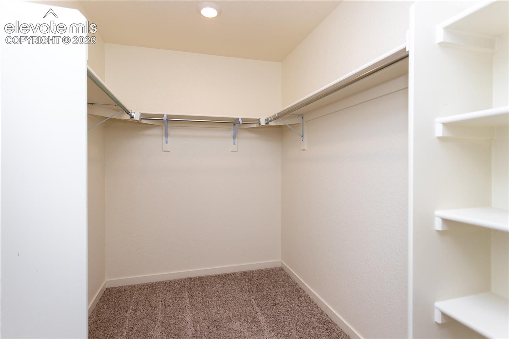 Very roomy walk-in closet completes the primary suite.