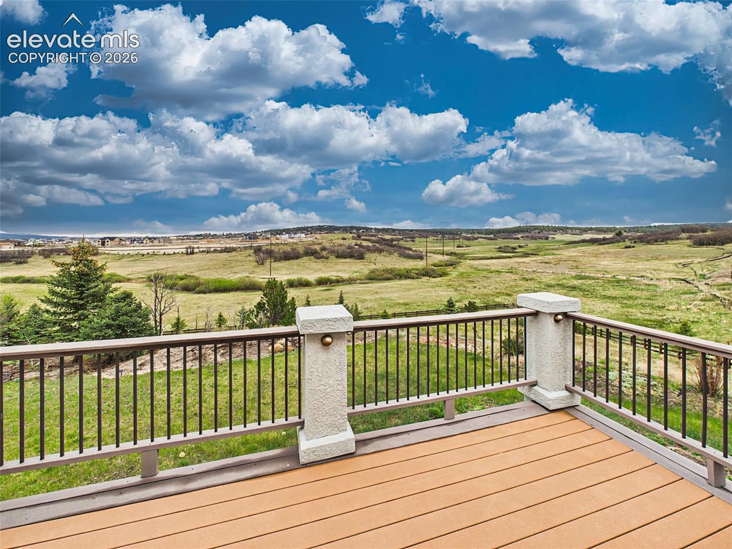 Stunning unobstructed views overlooking open space, creating a peaceful and scenic backdrop year-round.