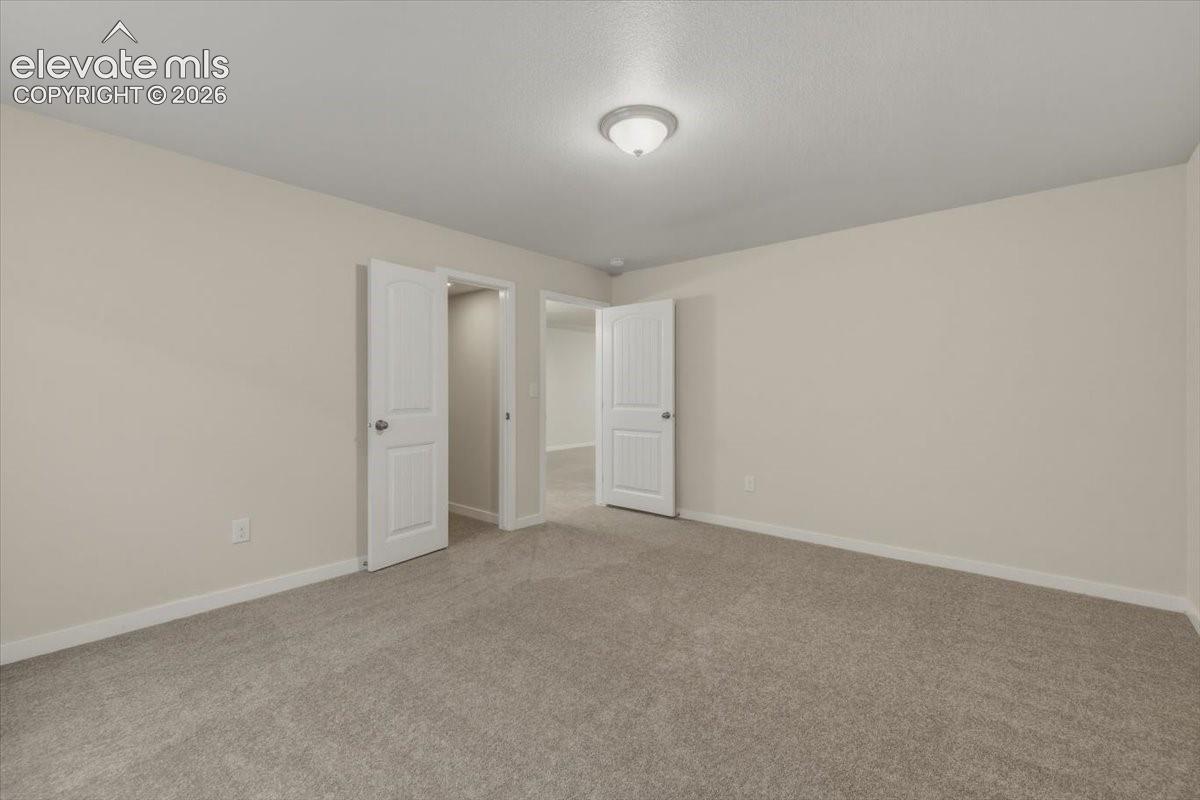 Bedroom with walk in closet.