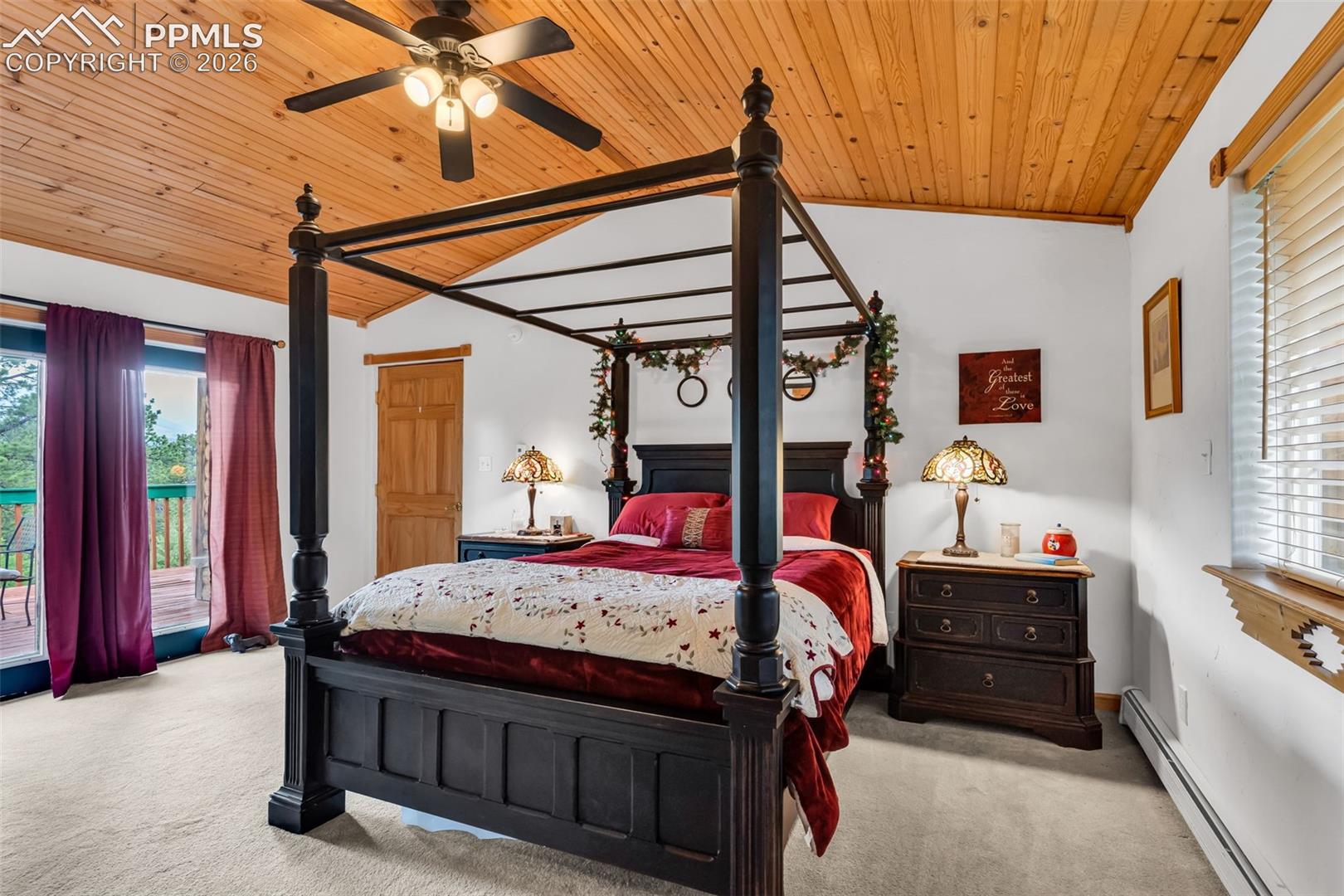 Master bedroom with walkout to deck and incredible mountain views