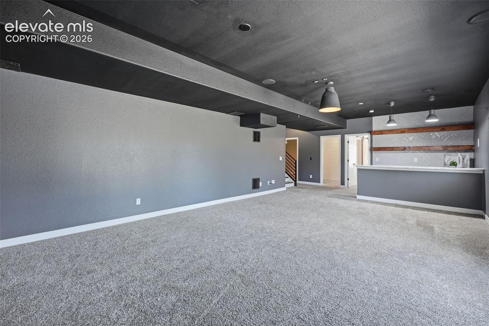 Basement is set up for a movie room!