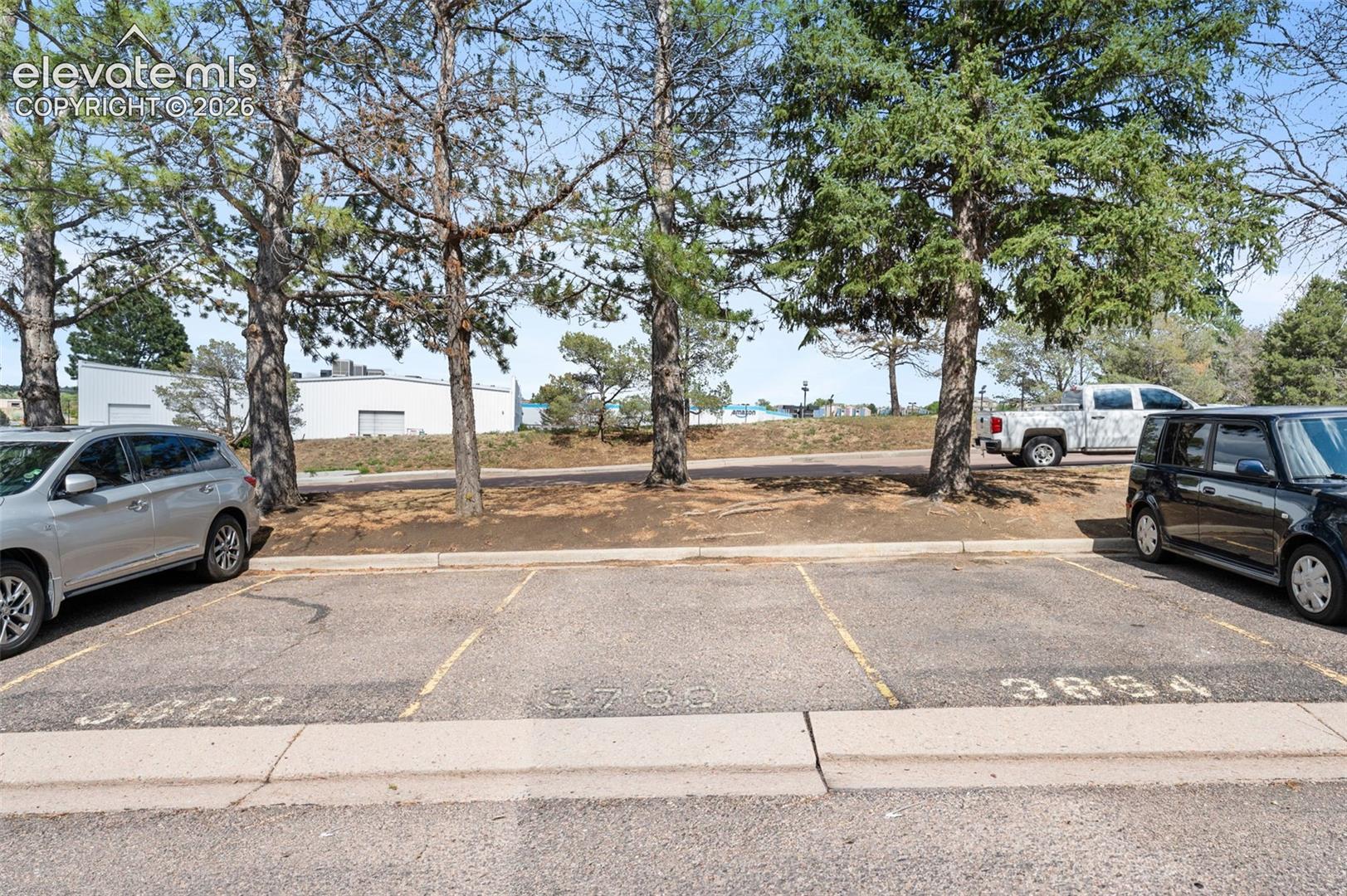 Parking space 3700 (to the East side of the building)