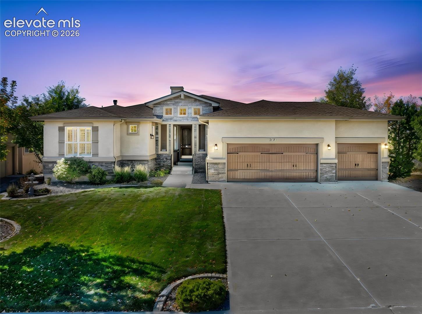 STUNNING RANCH HOME WITH THREE CAR GARAGE IN FLYING HORSE