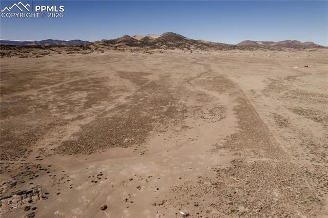 View of mountain background with a desert landscape and rural landscape