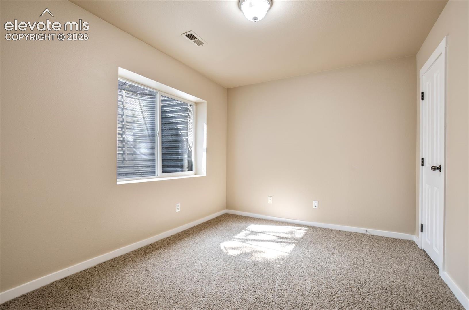 Basement 3rd bedroom with walk in closet