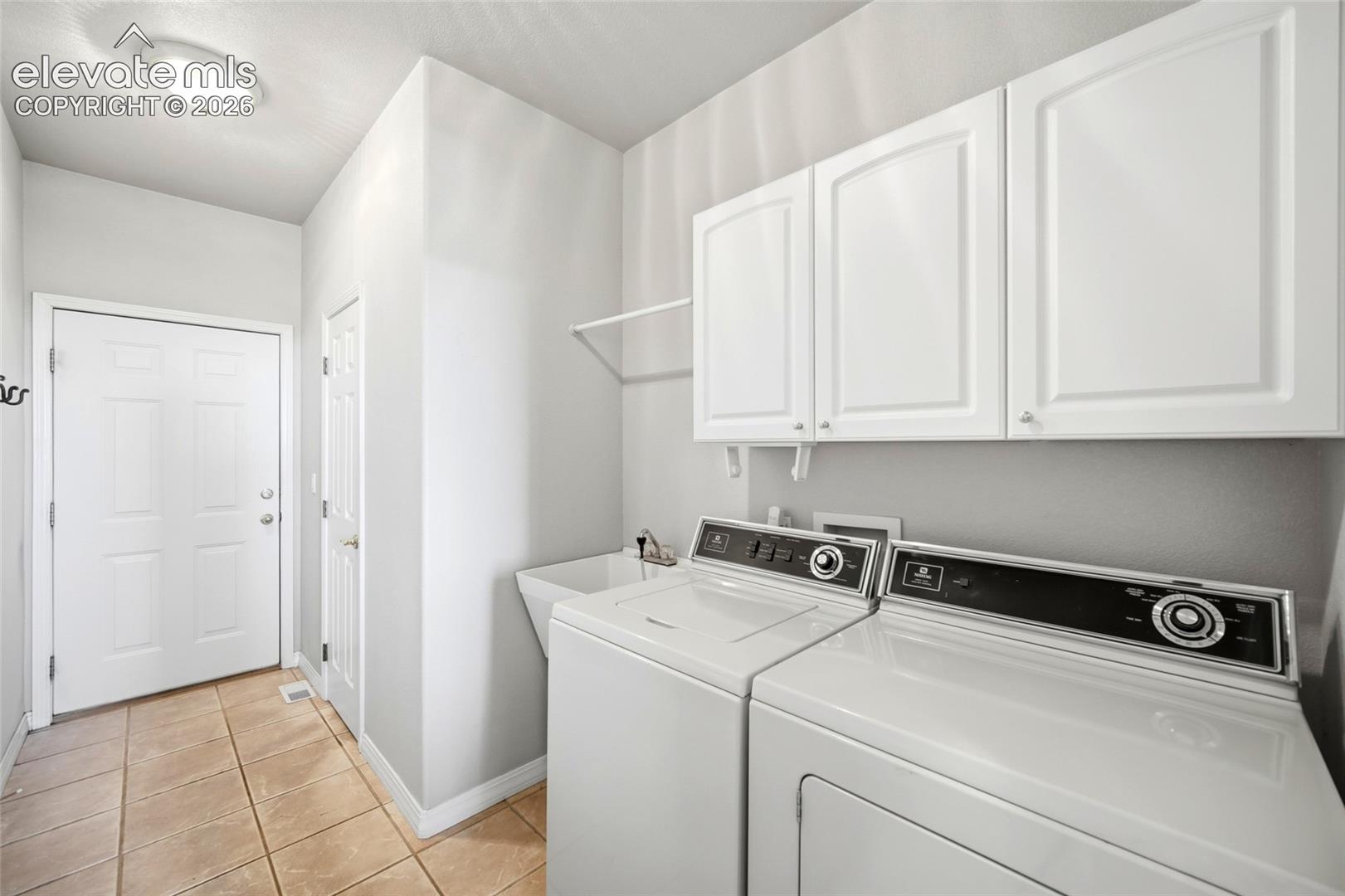 Main level laundry / mudroom for your convenience