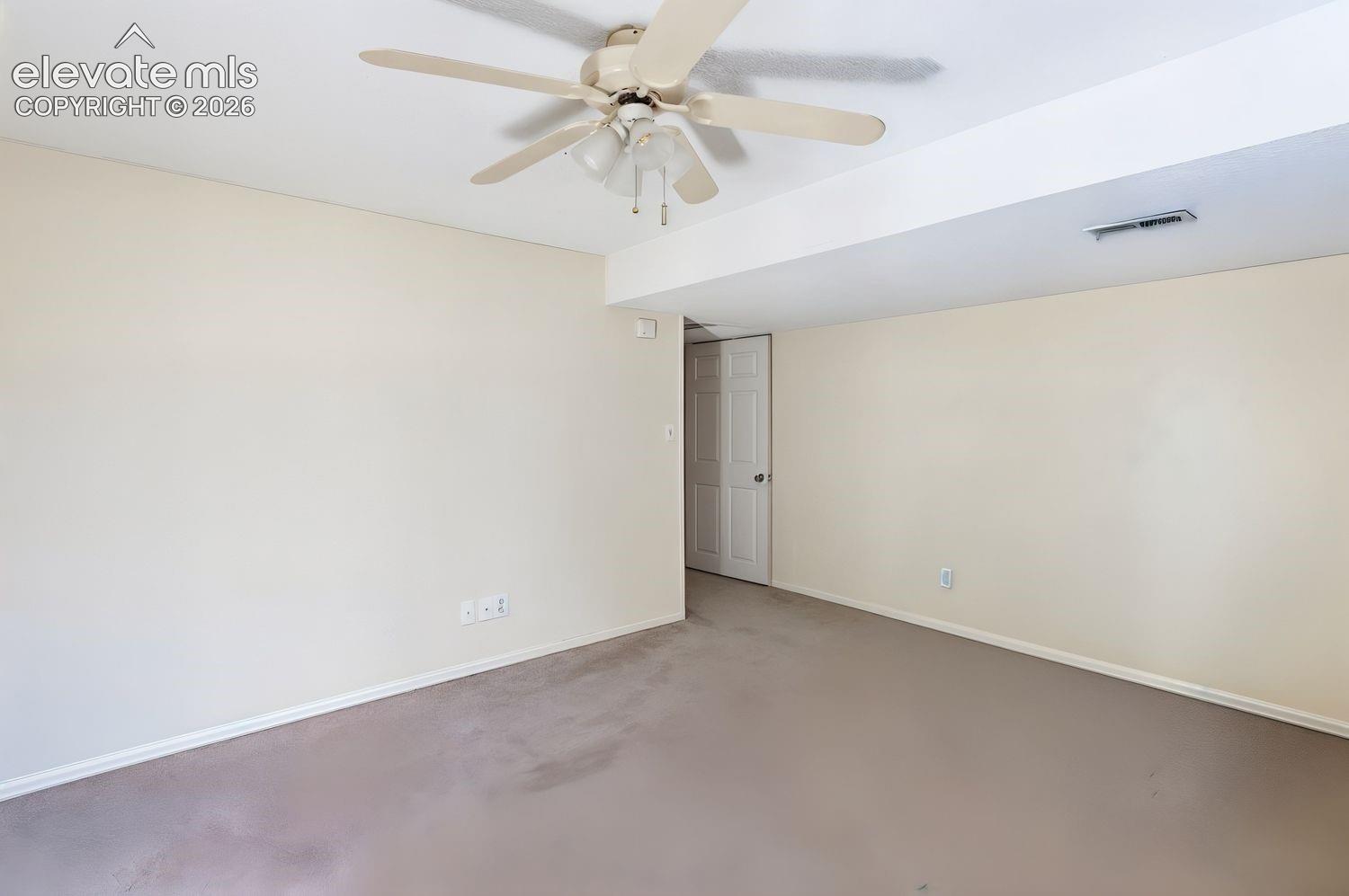 Basement Bedroom with carpet
