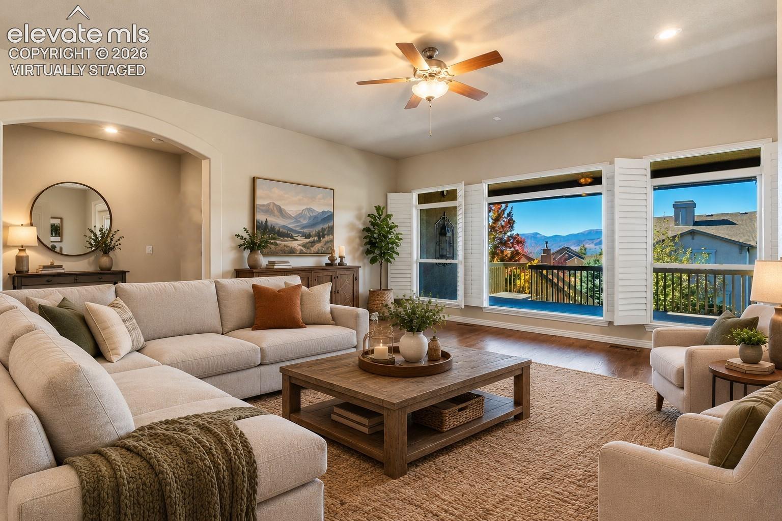 *VIRTUALLY STAGED* - LIVING ROOM WITH AMAZING VIEWS OF PIKES PEAK