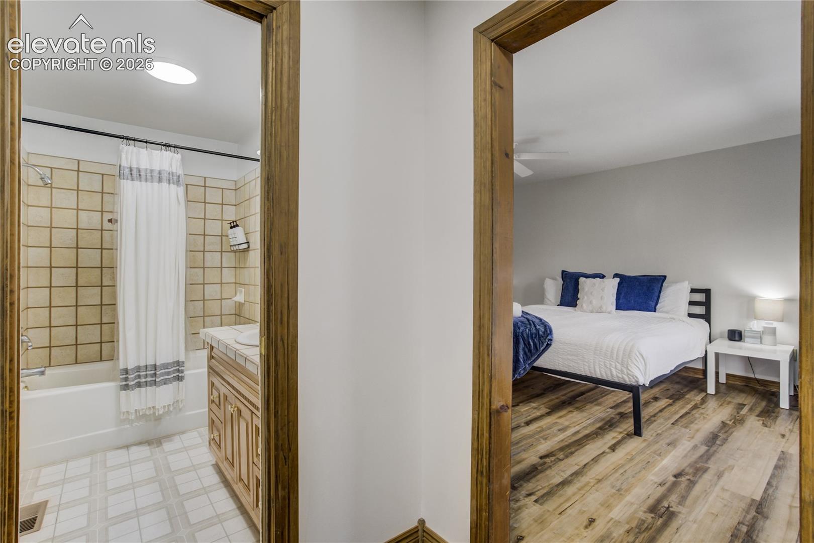 Main house - Photo of primary bathroom and bedroom