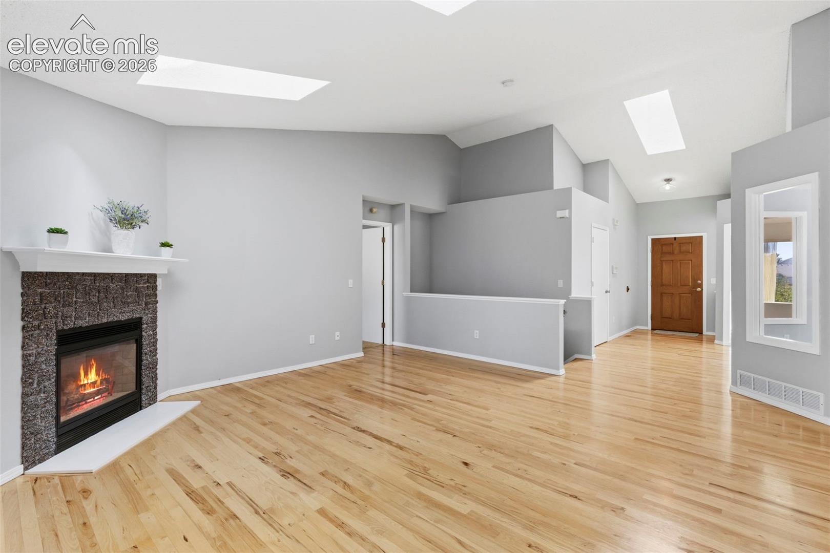 Gas fireplace & wood floors!