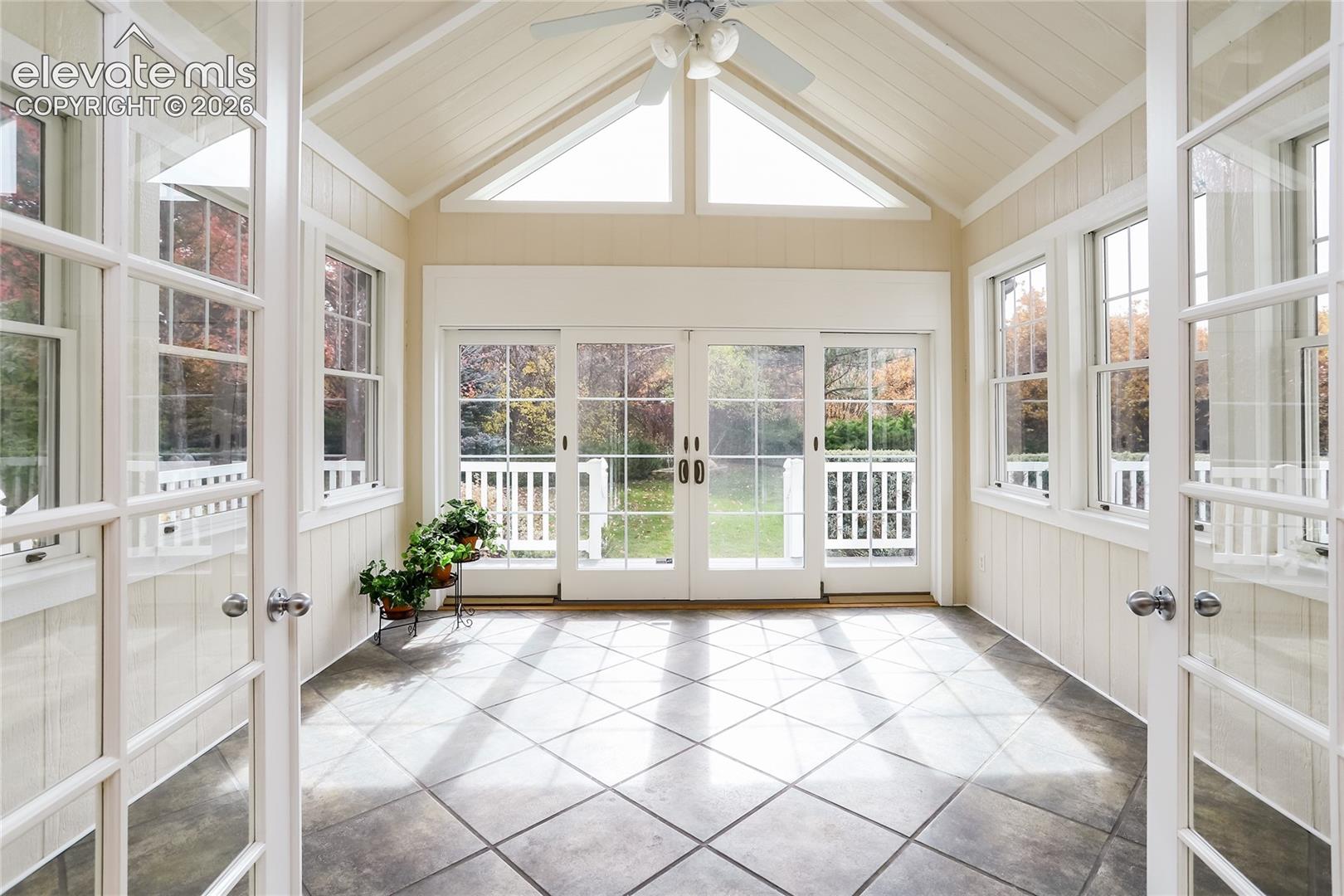 This amazing custom built Florida Room is one of the best features of this home! Wrap around windows lets you enjoy the gorgeous outdoor scenery year around!