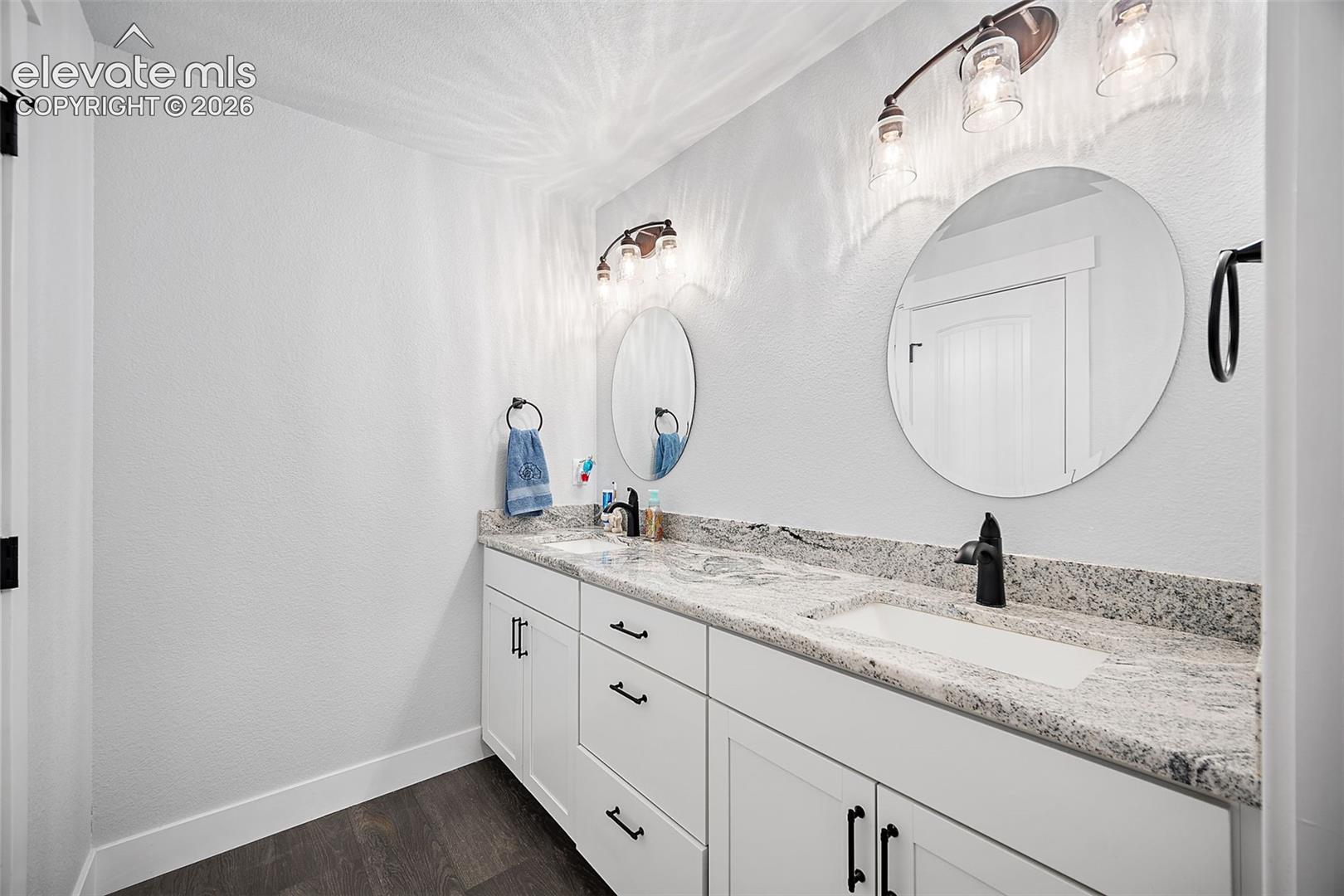Lower level bathroom with dual vanity