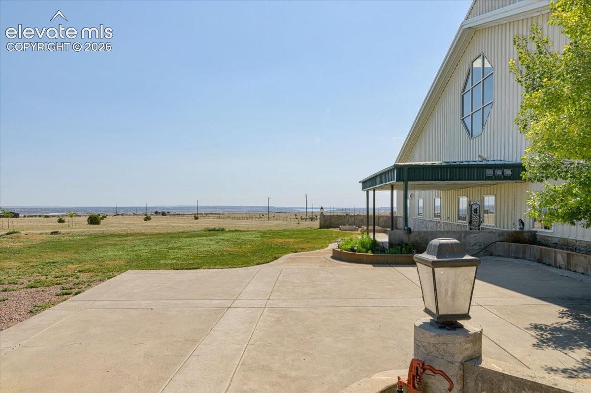 Large concrete pad and covered entrance