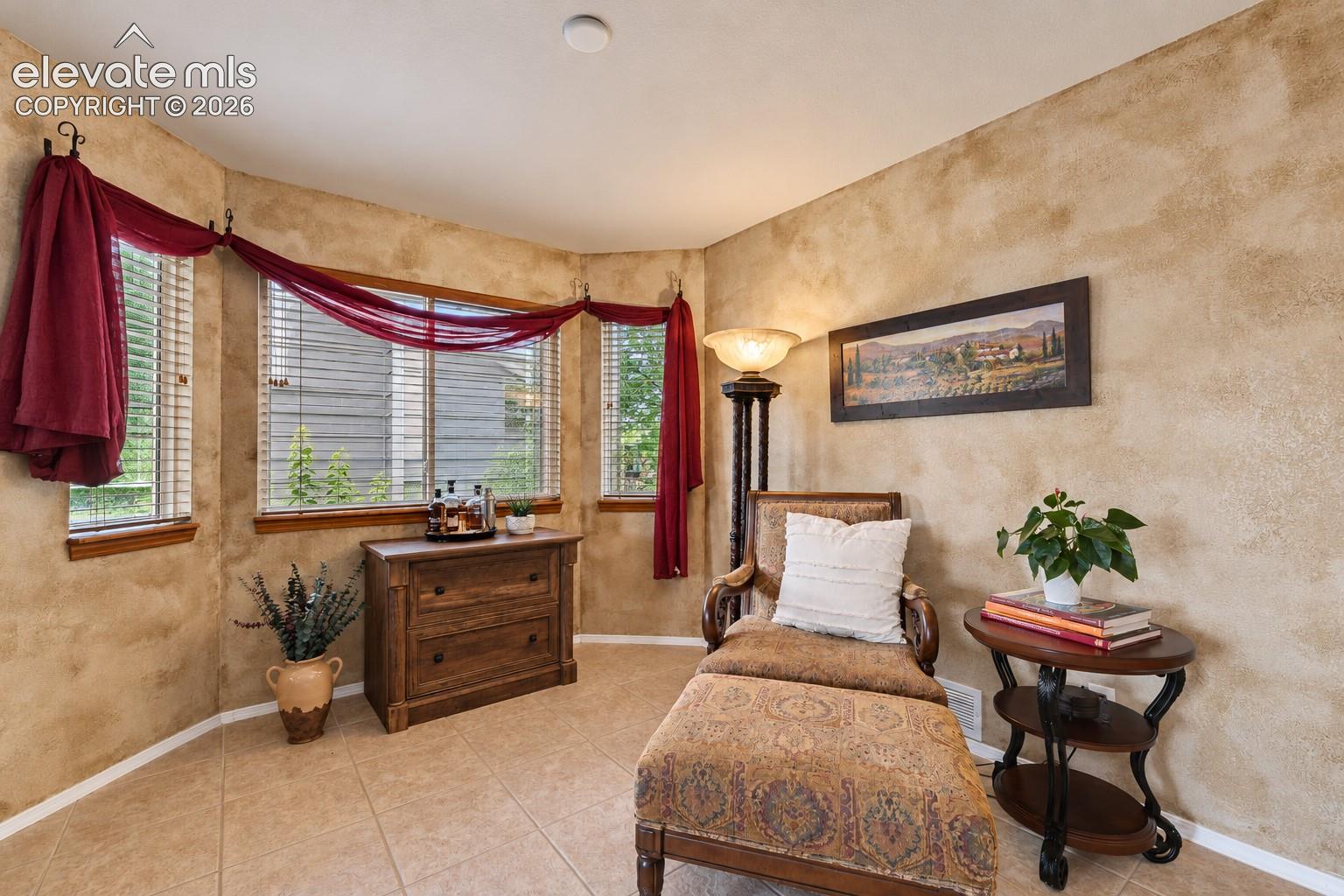 Sitting area in the Living Room with a bay window.