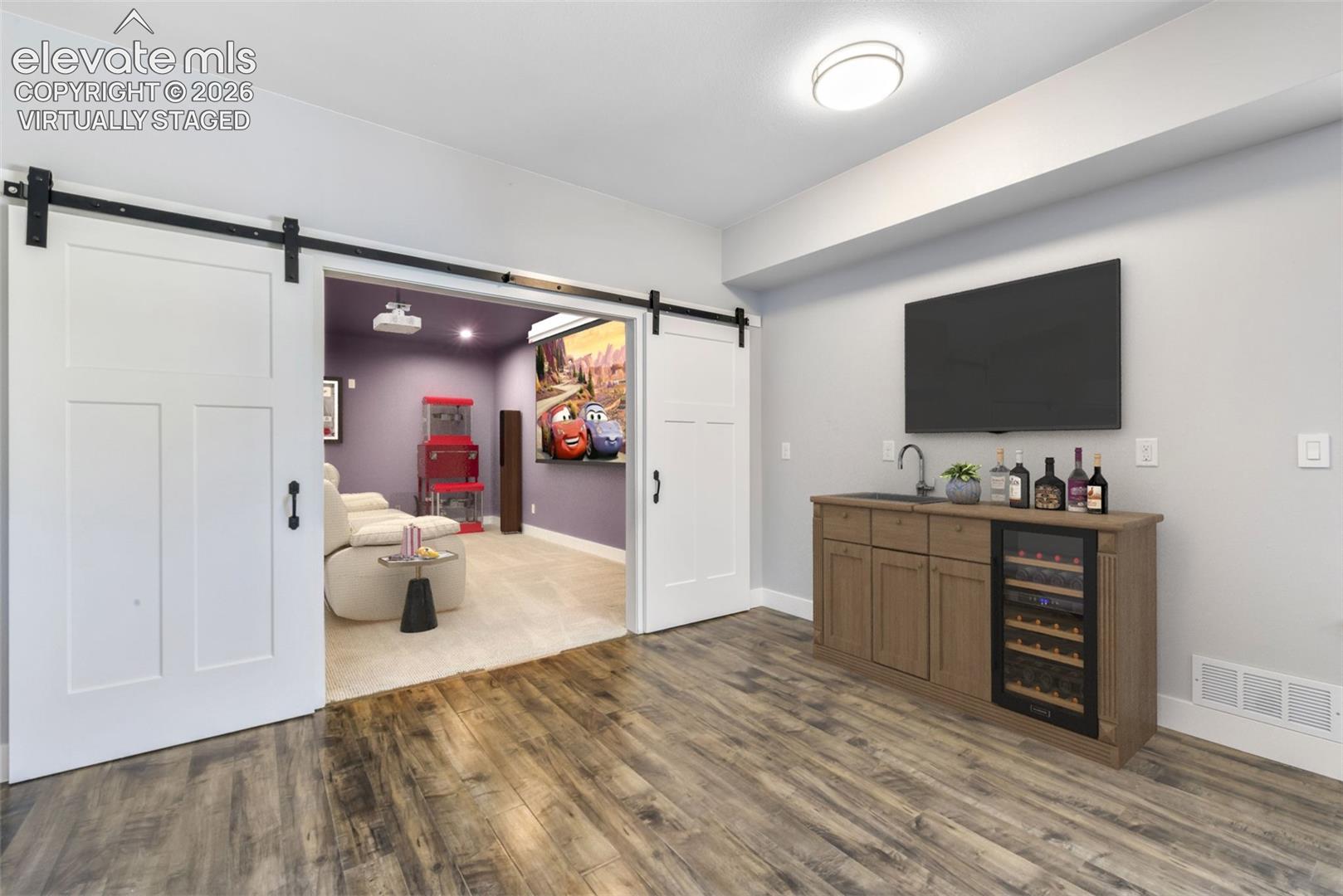 Huge family room for entertaining in basement virtually staged