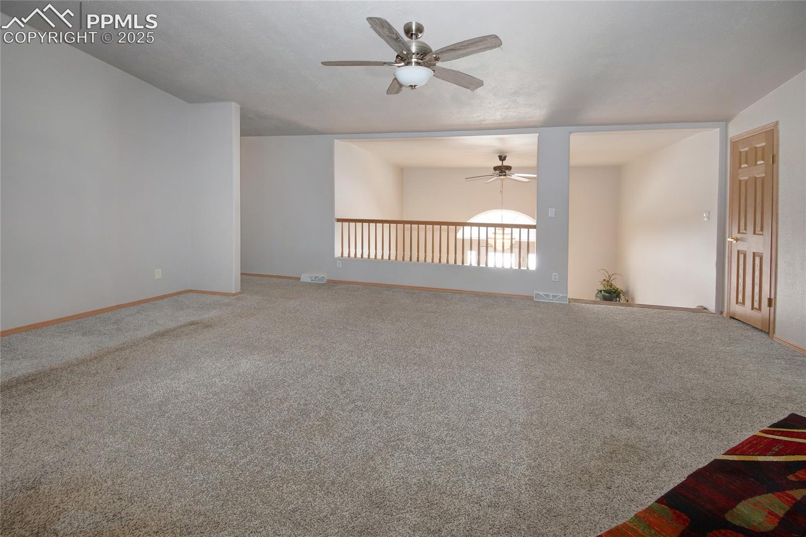 Living room oversees foyer