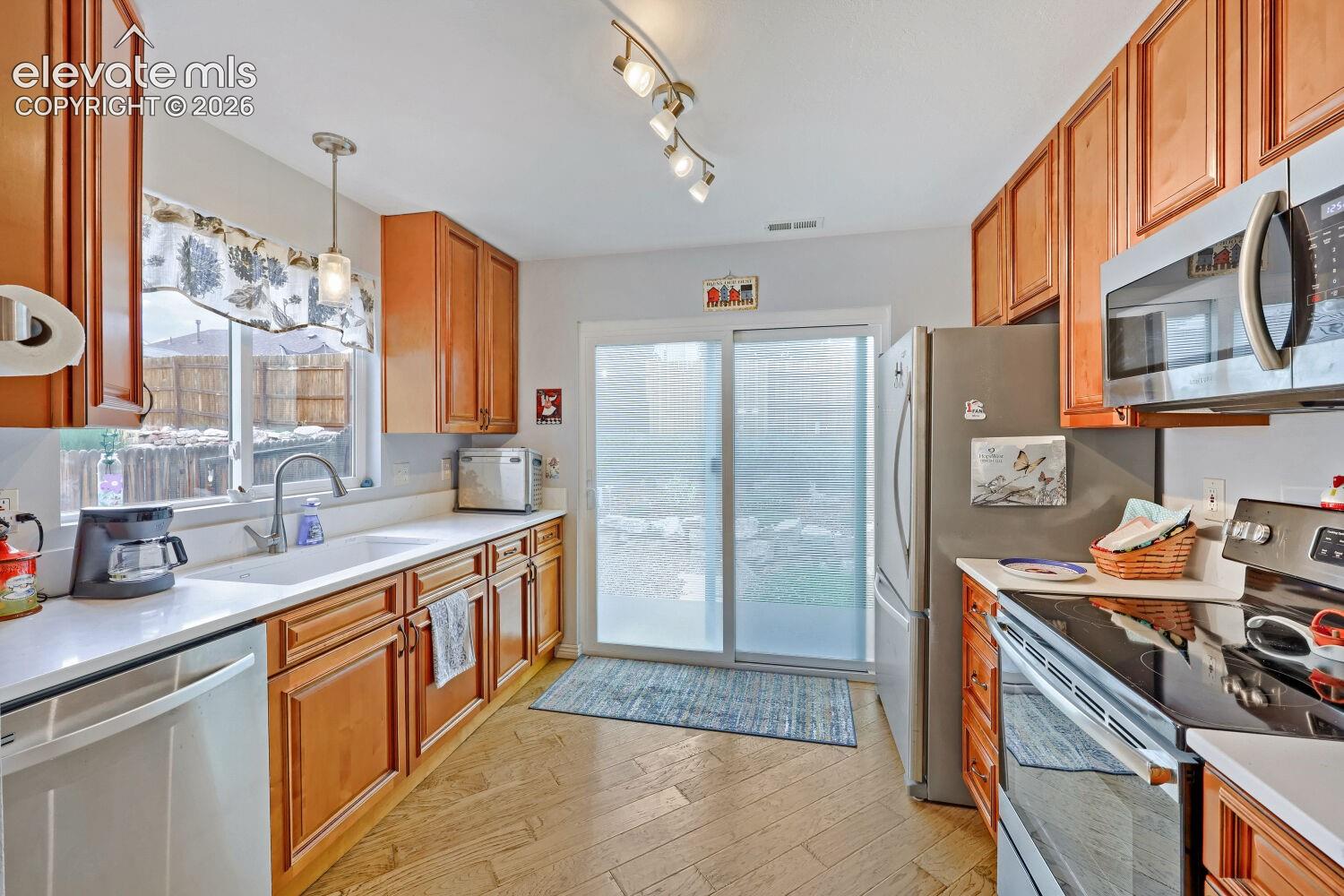 Quartz Countertops and stainless steel appliances