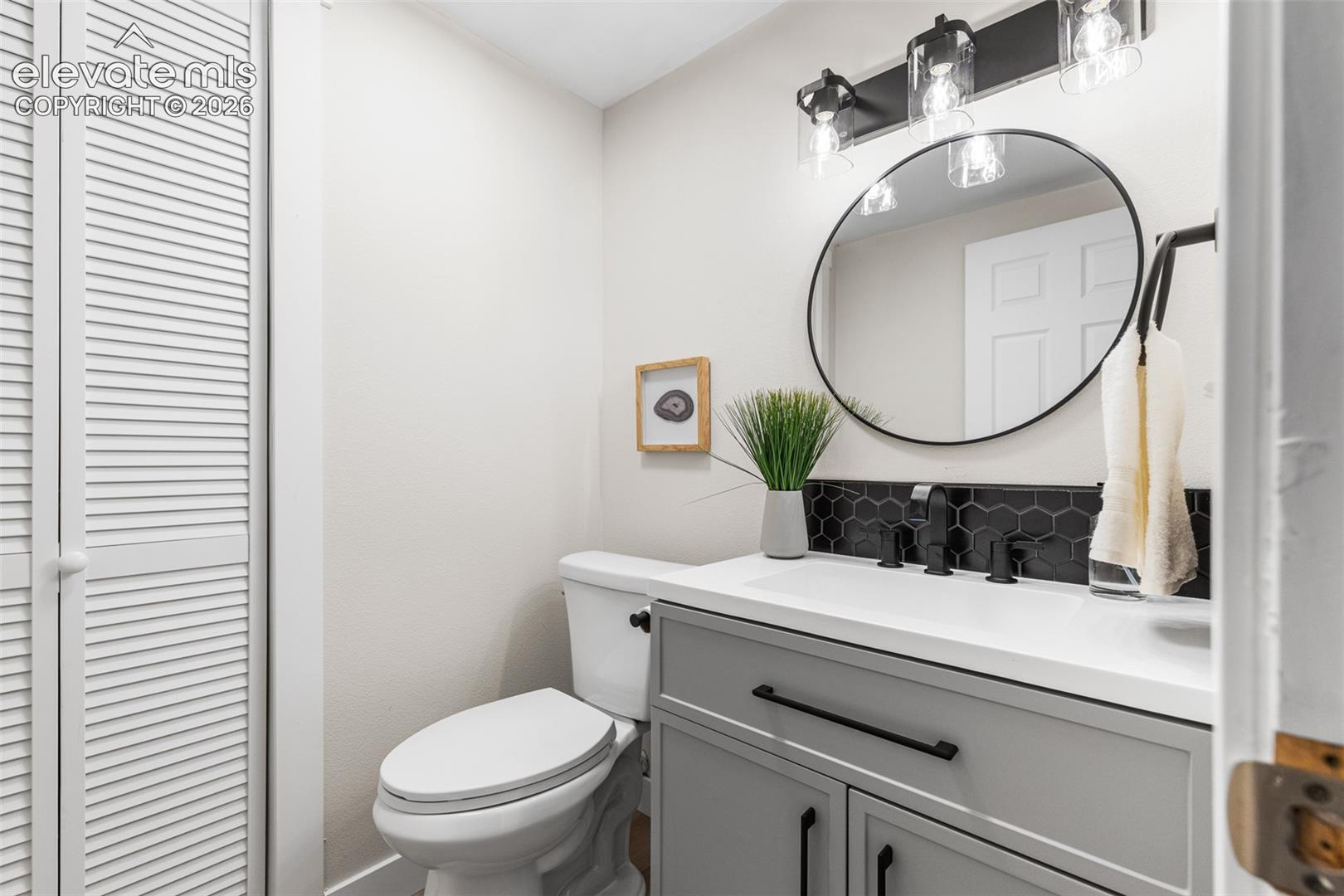 New vanity, fixtures, flooring and paint in this bathroom.  