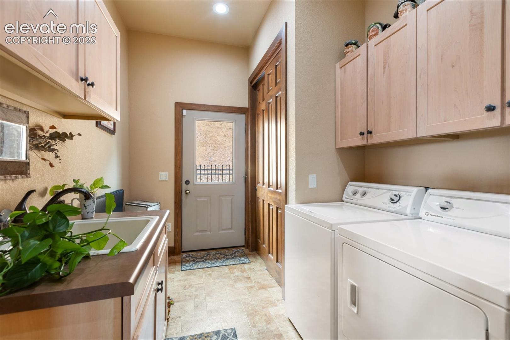 Laundry room that leads to dog run