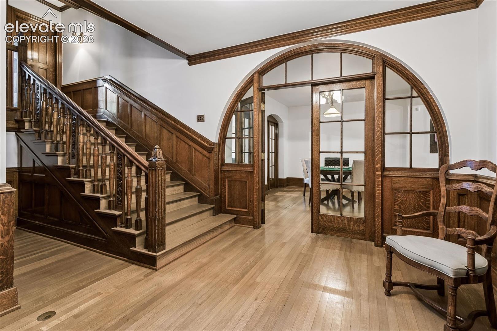 Original oak woodwoork leading to basement