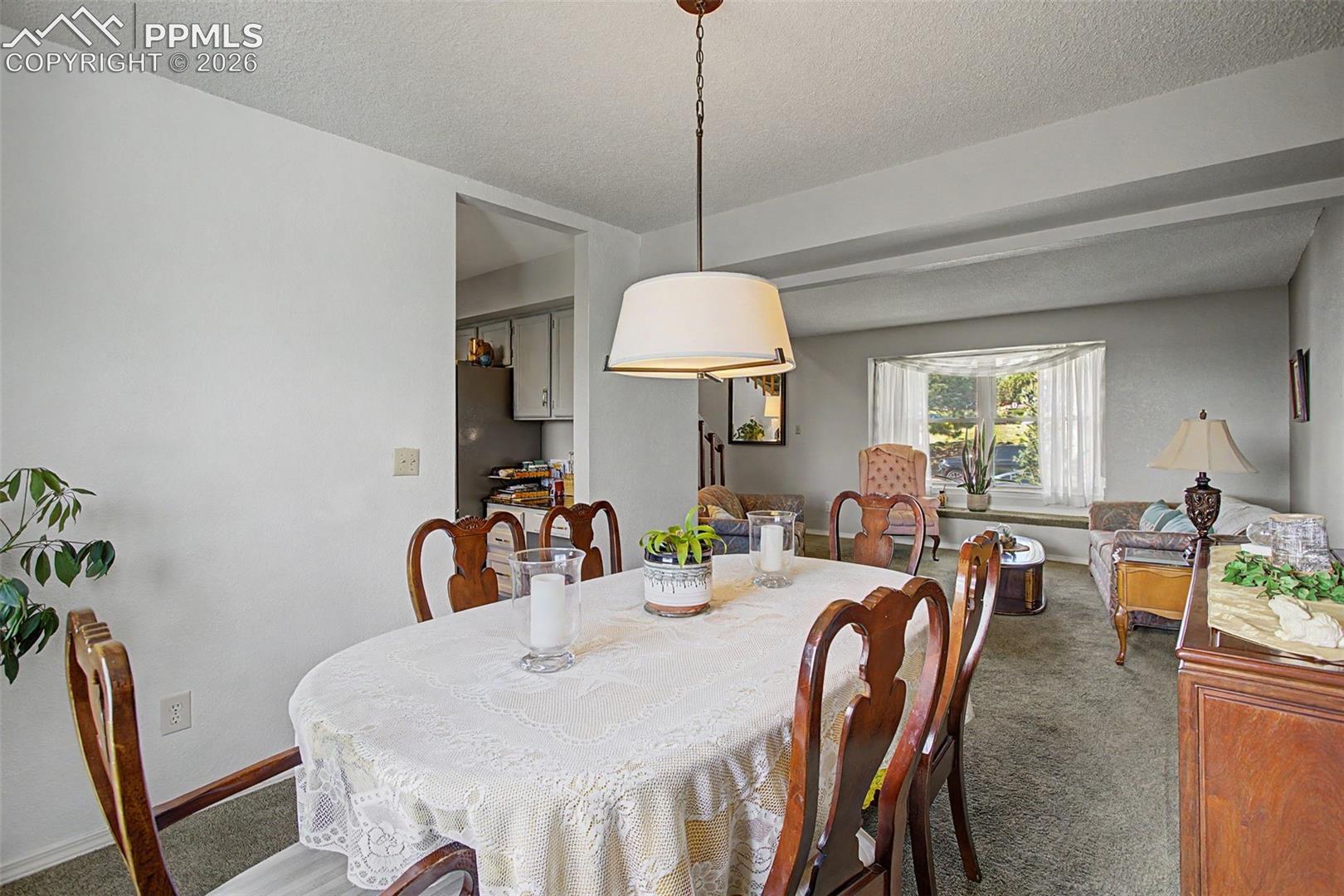Formal dining room, leading to the kitchen.