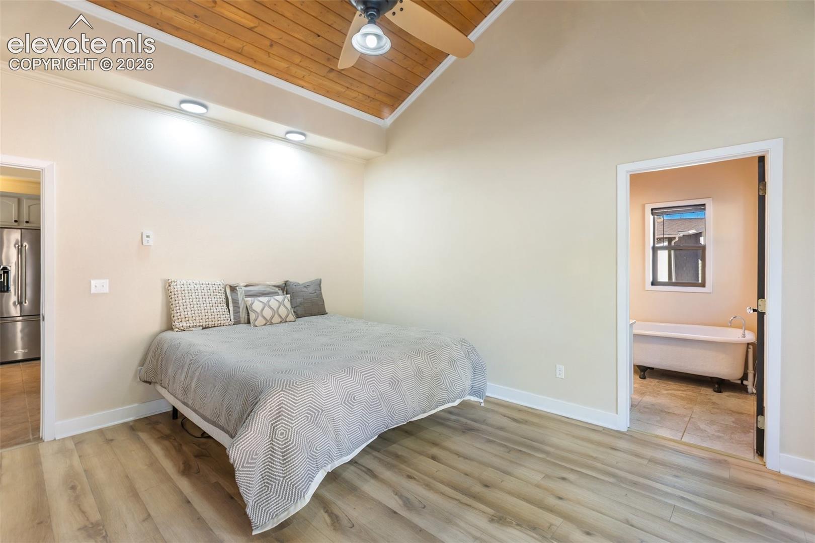 Primary Bedroom with vaulted ceilings