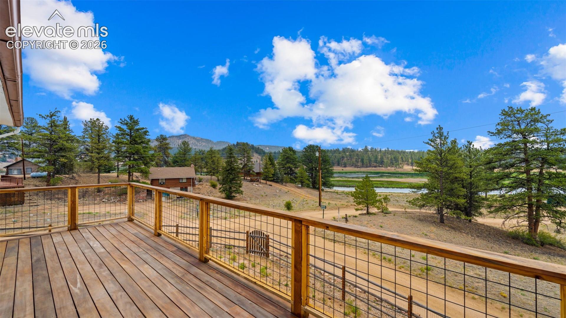 Beautiful Tiger Wood wrap deck with a view!!