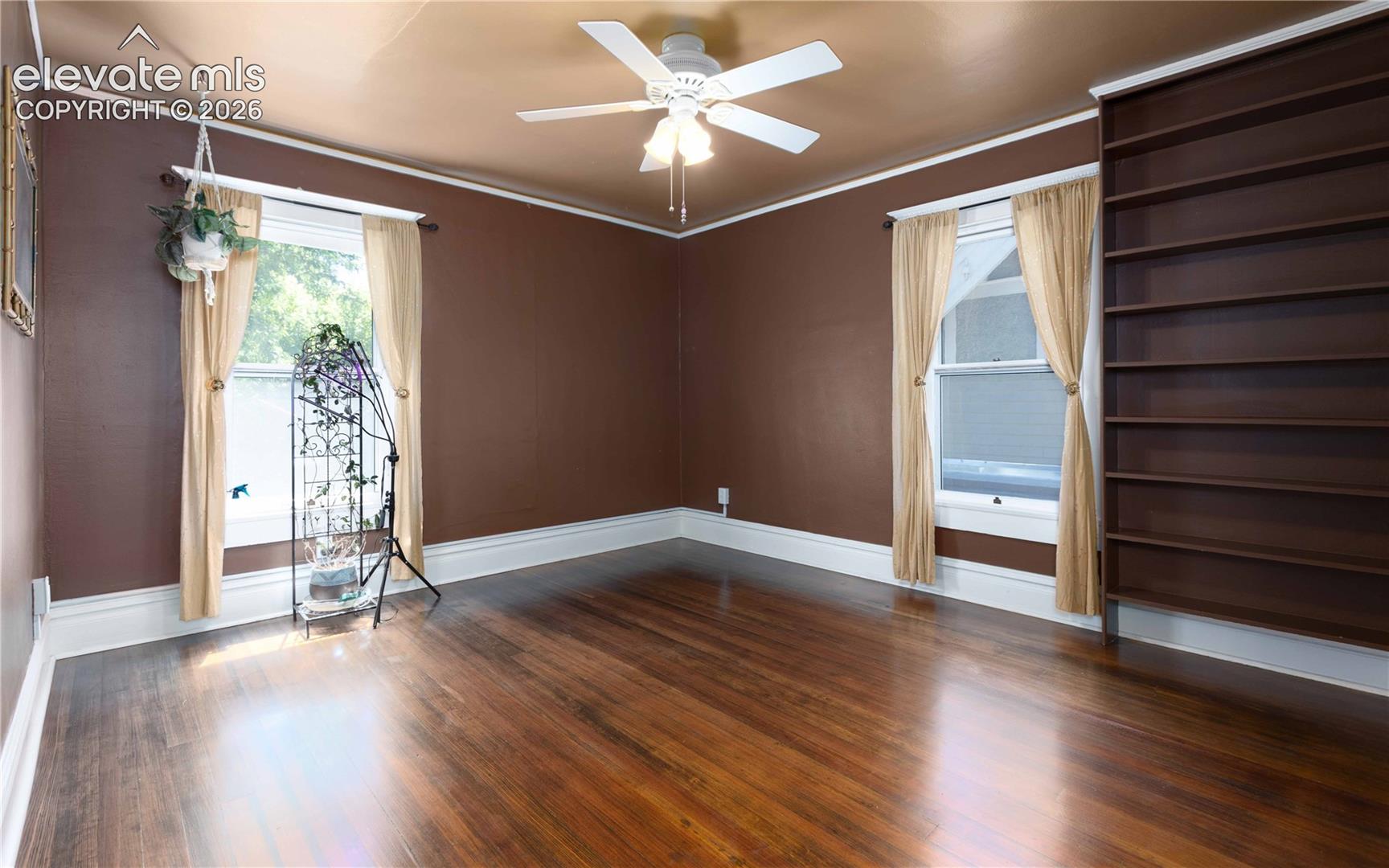 4th bedroom looks out over back and side yard