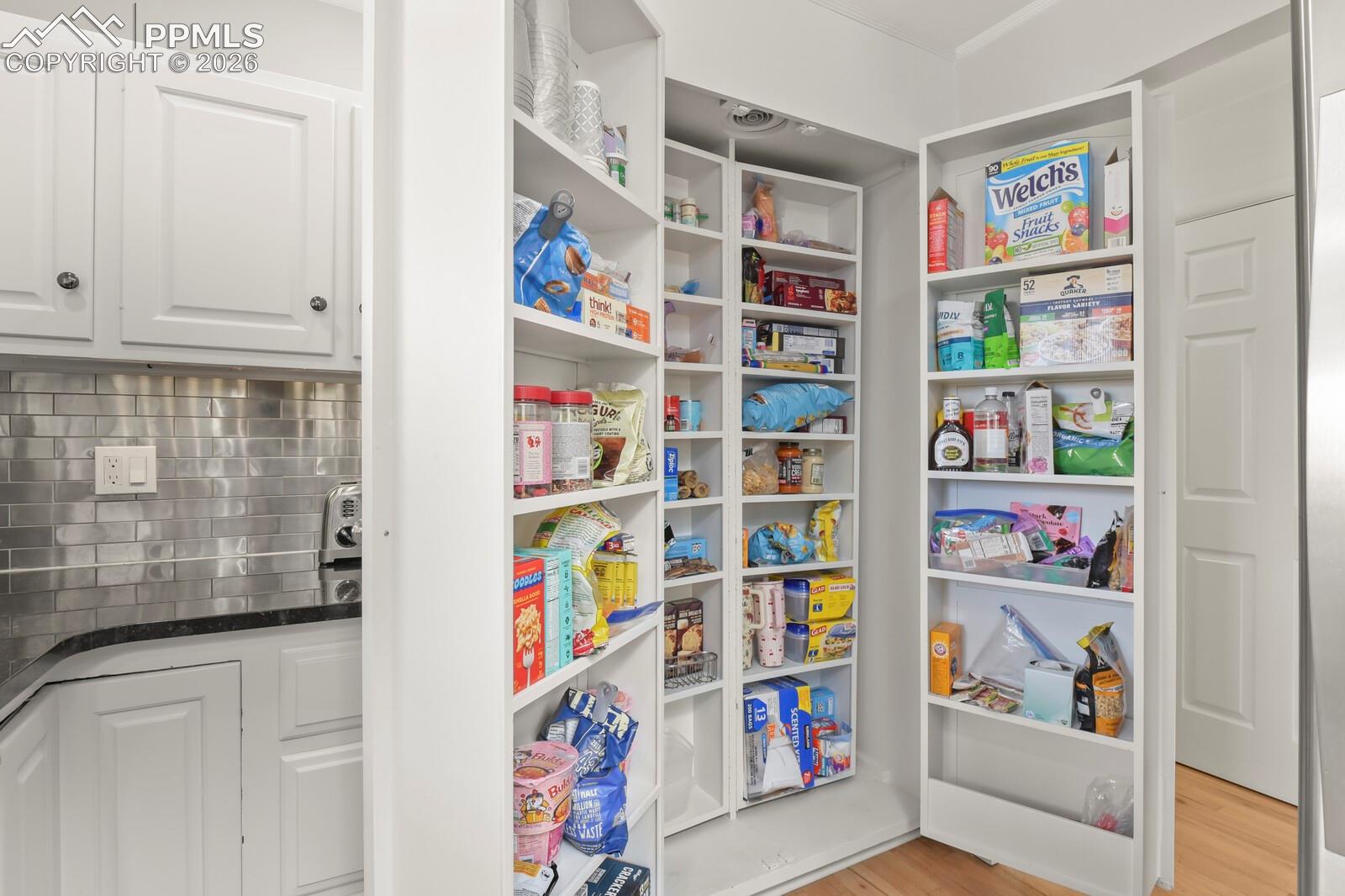 Integrated pantry system featuring multiple tiered shelves