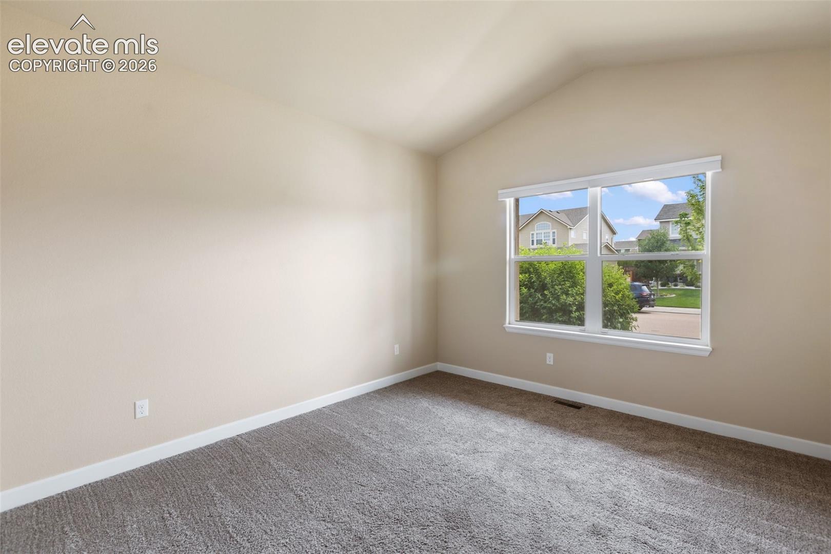 Front Bedroom on the main level with a Closet or an Office