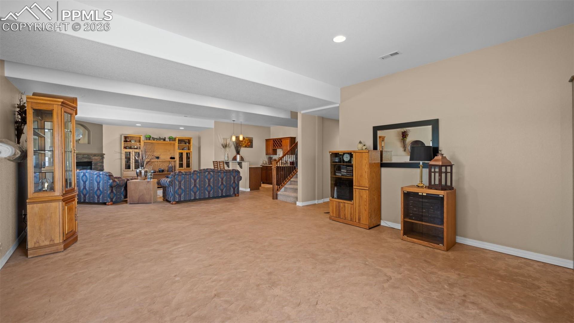 Family room offers multiple options, perfect for a game room!