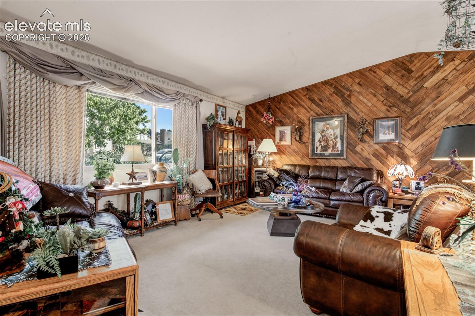East Facing picture window contributes to the inviting Living room