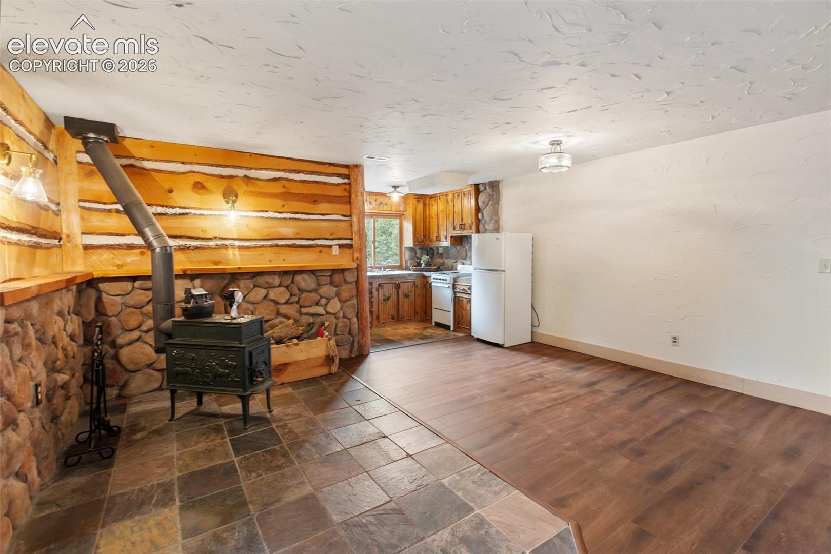 Lower Level Dining Area with wood Stove