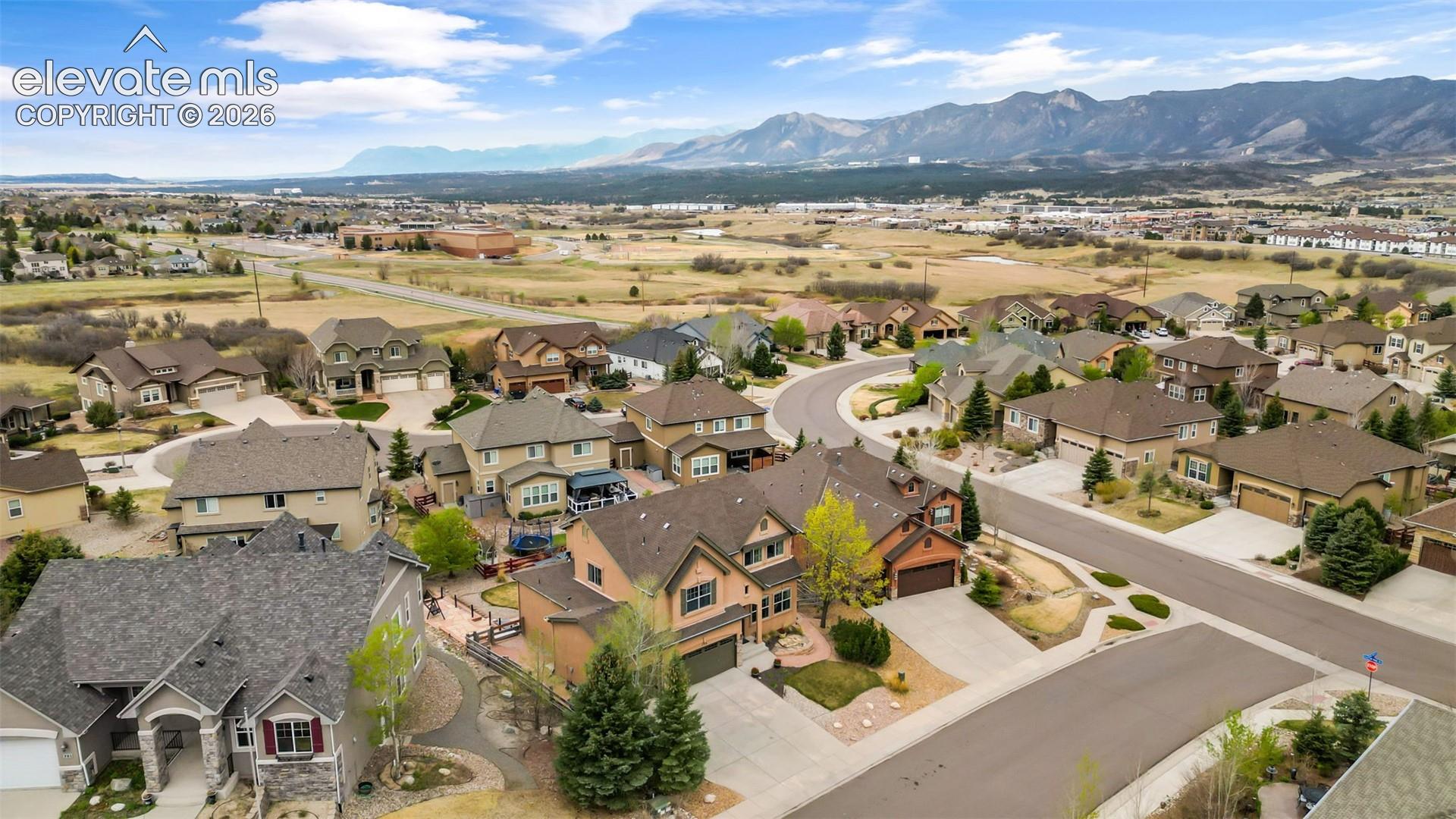 Residential neighborhood featuring diverse architectural styles and mature landscaping