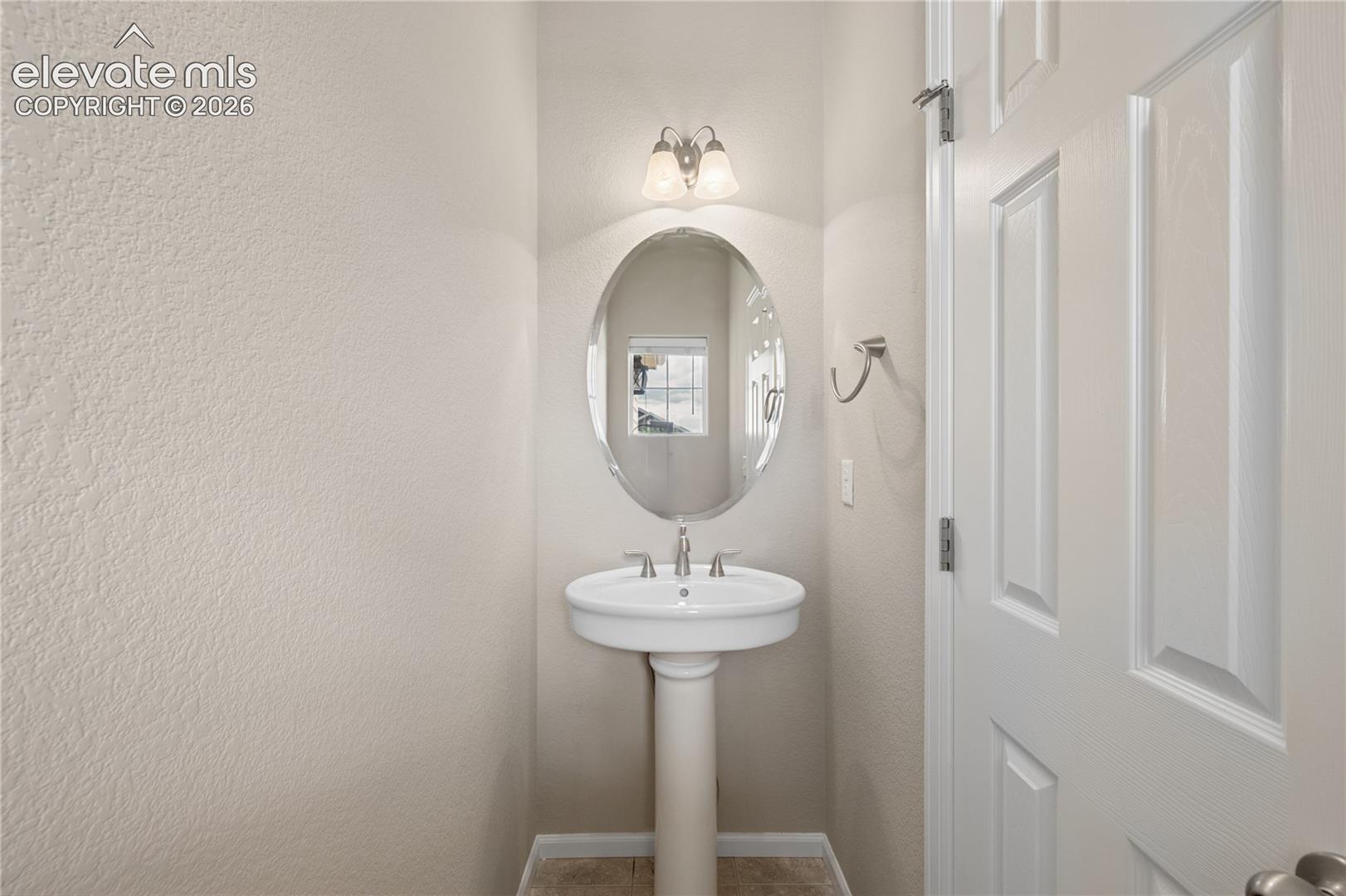 Main level half bathroom 