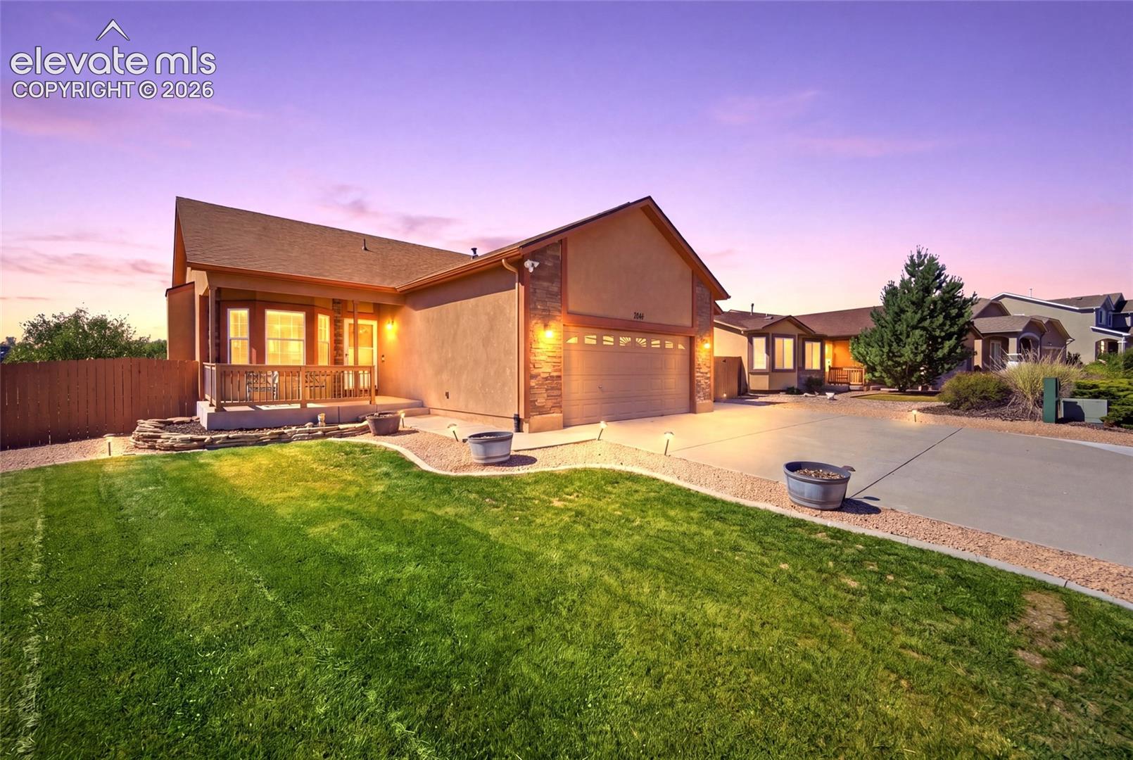 Welcome home to this beautifully maintained 4-bedroom, 3-bathroom home in the desirable Glen at Widefield, perfectly positioned next to open space with gorgeous Pikes Peak and mountain views! Featuring a 3-car garage, stucco exterior, beautiful landscaping and a spacious, functional layout, this home has so much to offer.Step inside to soaring ceilings and a bright living room centered around a stunning stone gas fireplace and bay window. The updated kitchen features granite countertops, soft-close cabinetry and LVP floors, flowing seamlessly into the light-filled dining area. Step outside onto the spacious deck and take in those incredible Pikes Peak views- the perfect setting for morning coffee, evening sunsets or entertaining.The main level offers a primary suite with a full bathroom, an additional bedroom, full hall bath and conveniently located laundry area. Downstairs, the fully finished walk-out basement provides two more bedrooms, a ¾ bathroom, generous storage/mechanical space and a large family room with direct access to the backyard patio and hot tub.The HUGE fenced backyard with sprinkler system is made for enjoying Colorado living, storage shed, and open space just beyond the fence with a nearby walking path. With a front porch, spacious back deck and lower patio, there are multiple outdoor spaces to relax and entertain. The home's enduring Class 4 Roof provides the peace of mind. Additional features include central A/C, a radon mitigation system, washer and dryer, natural gas hookup for a grill, 50-gallon water heater and epoxy garage floor. Conveniently located just minutes from shopping, dining, Fort Carson and Peterson Air Force Base, this immaculate home combines space, views, upgrades and an incredible setting. Don’t wait any longer- schedule your private showing today!