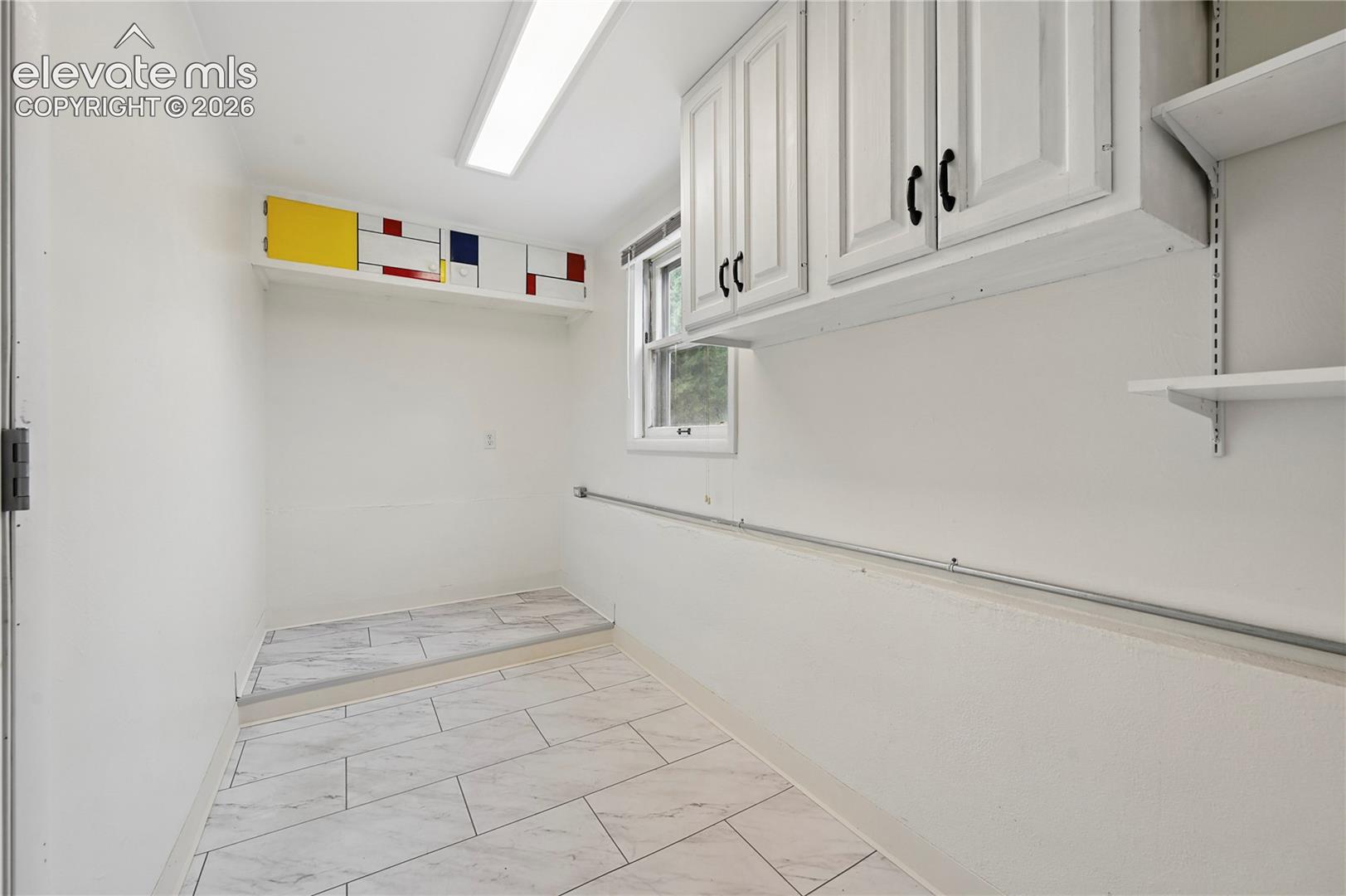 HUGE, Expanded Laundry with LOTS of Storage!!