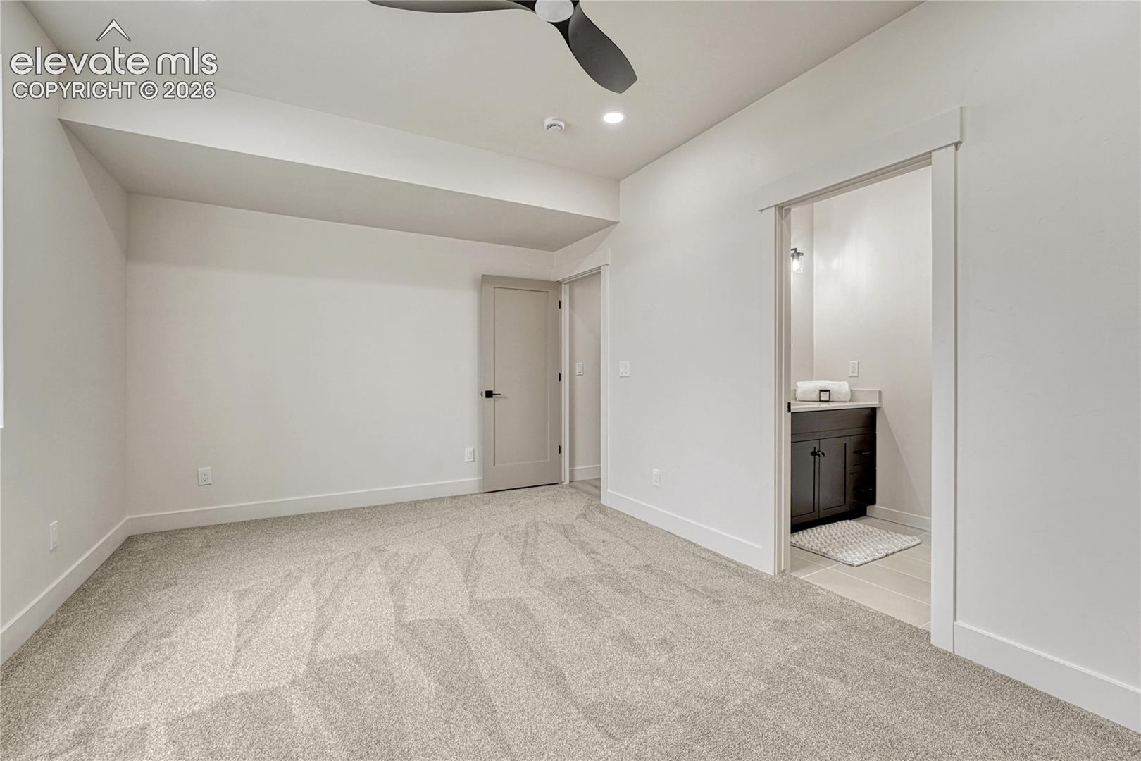 Second of two lower level bedrooms...