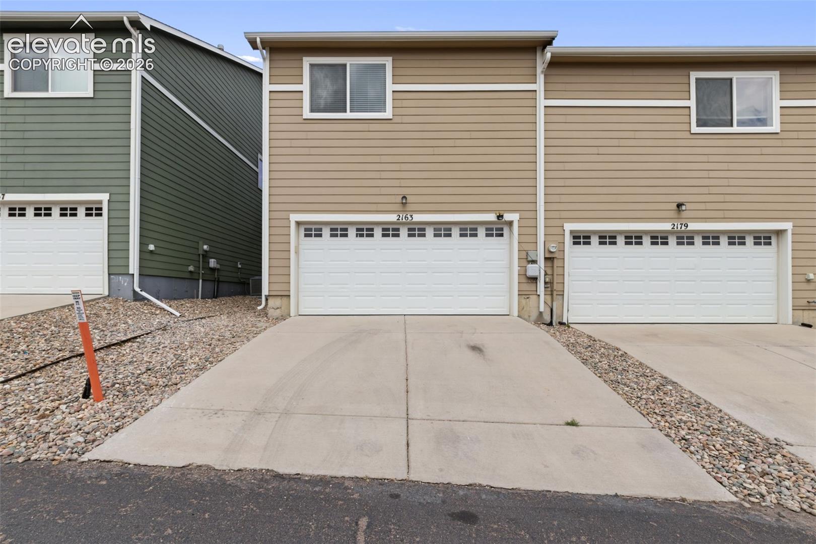 Never worry about parking or storage again with the highly convenient attached two-car garage located at the rear of the home