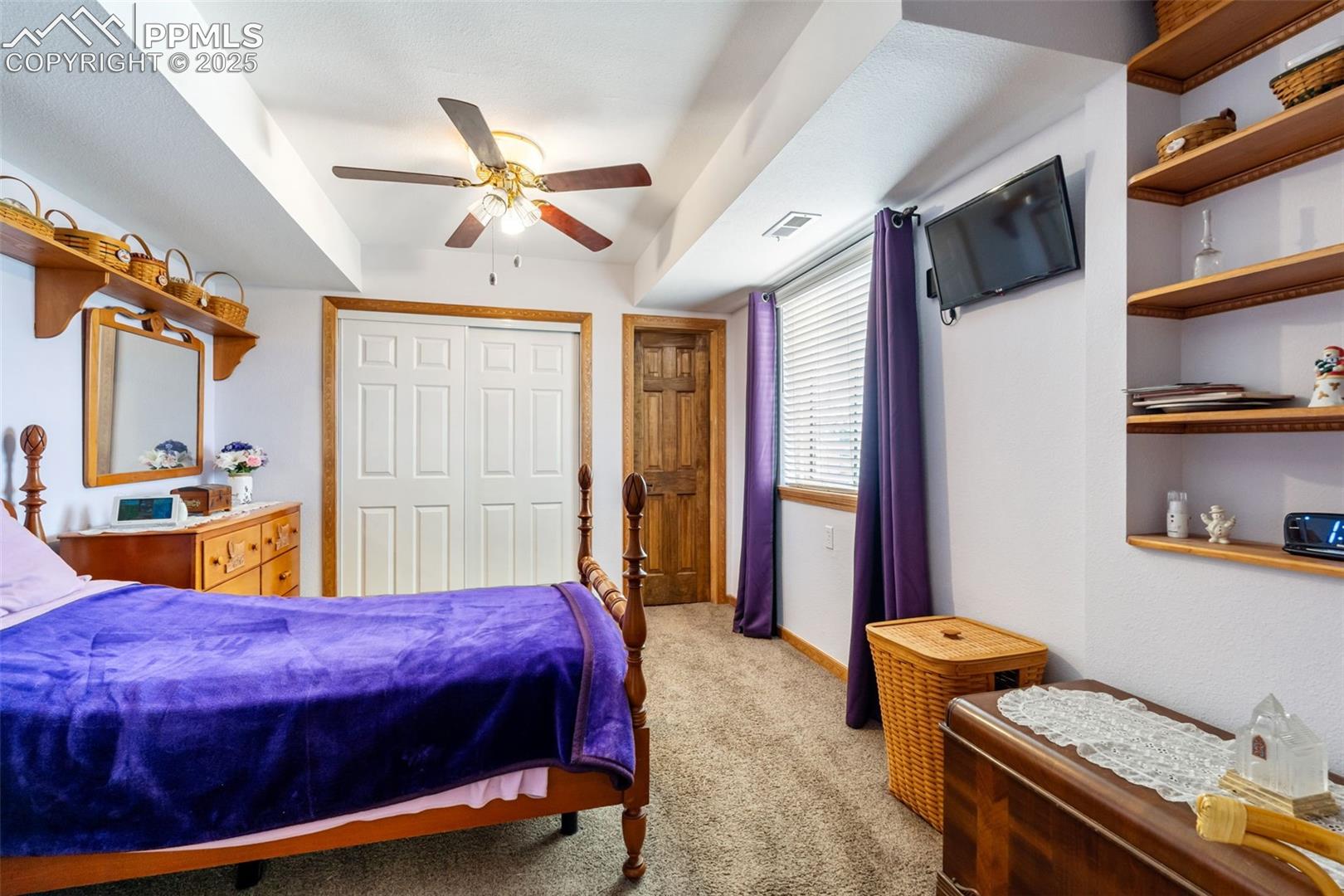 Additional view of master suite with built-ins
