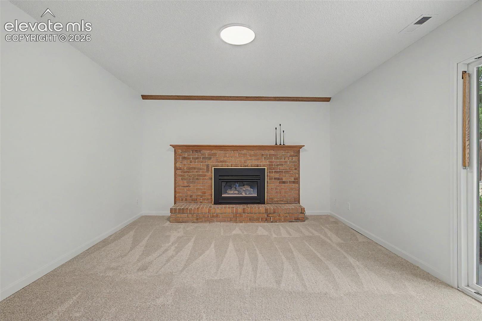 Cozy Family Room with Gas Firepalce
