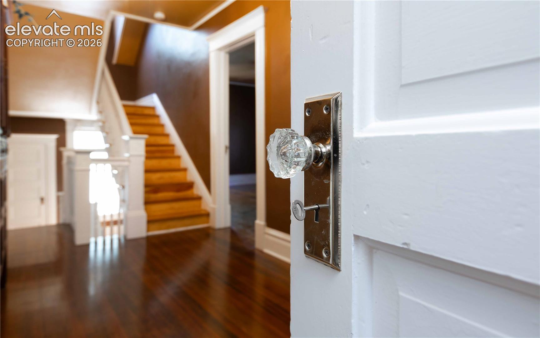 Beautiful sunlight pours onto the second story foyer leading to 4 bedrooms and bath