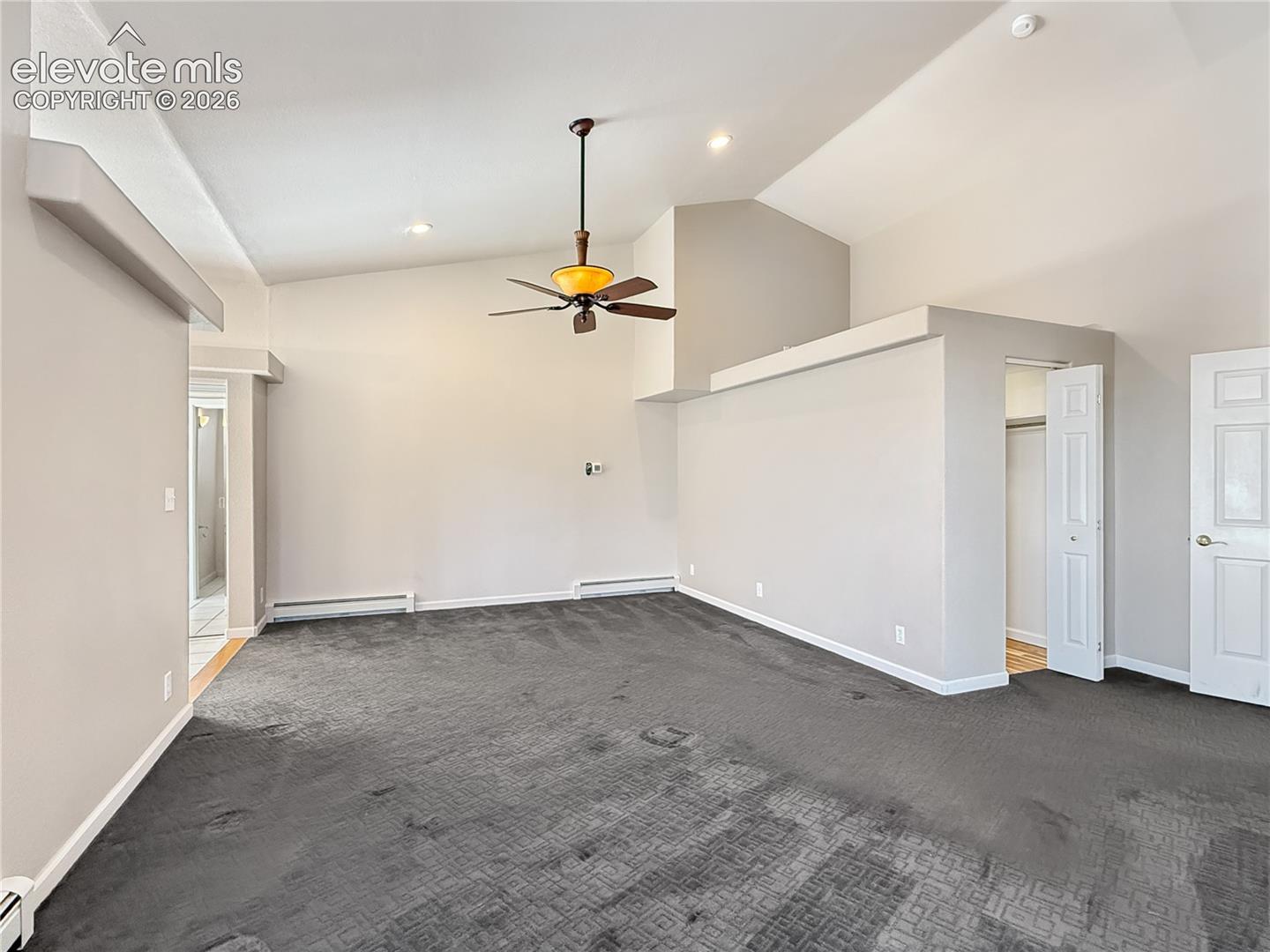 Primary has enough rom for a sitting area, closet to the right