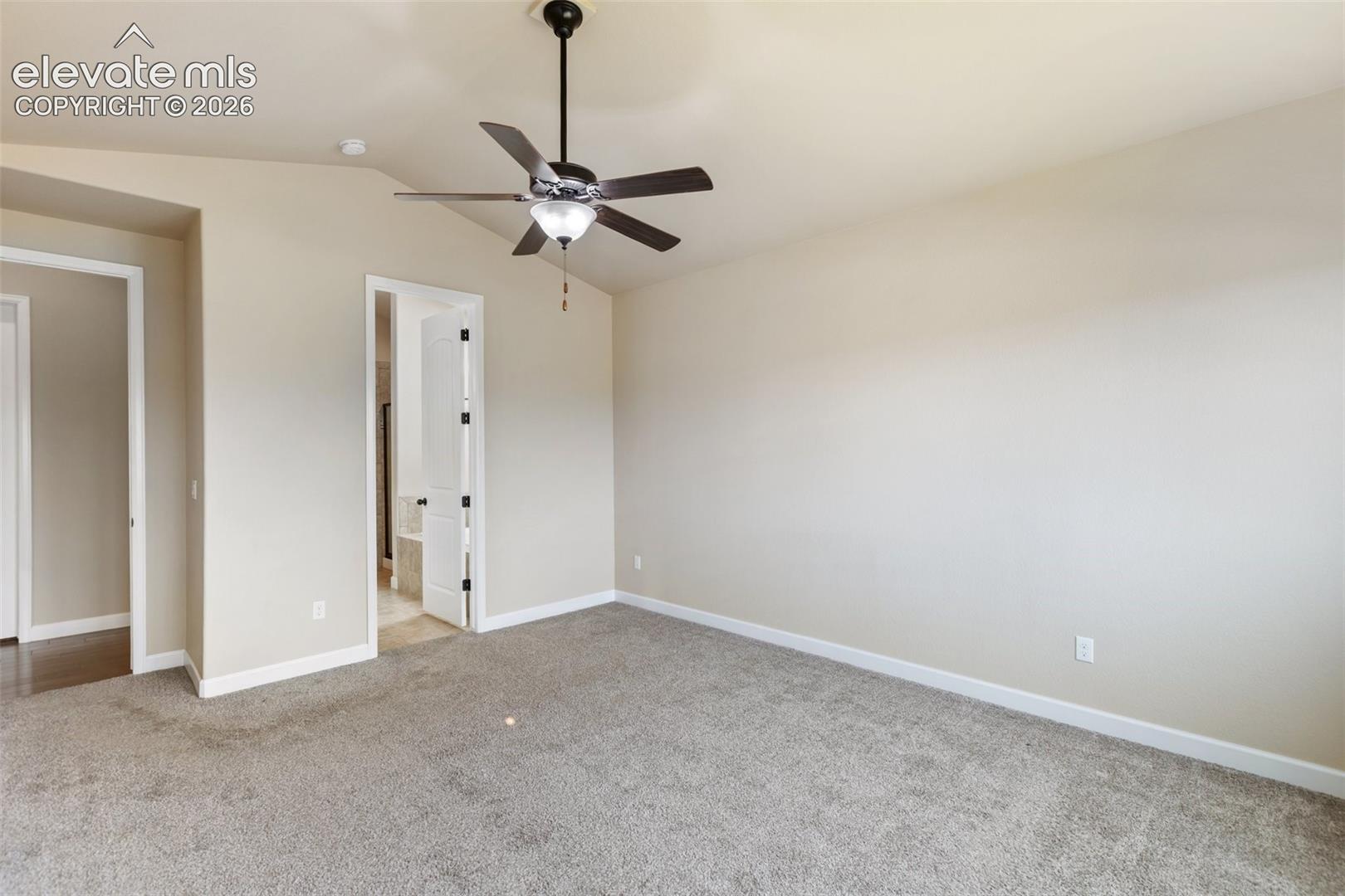 Primary Bedroom leads to a 5 piece bathroom suite