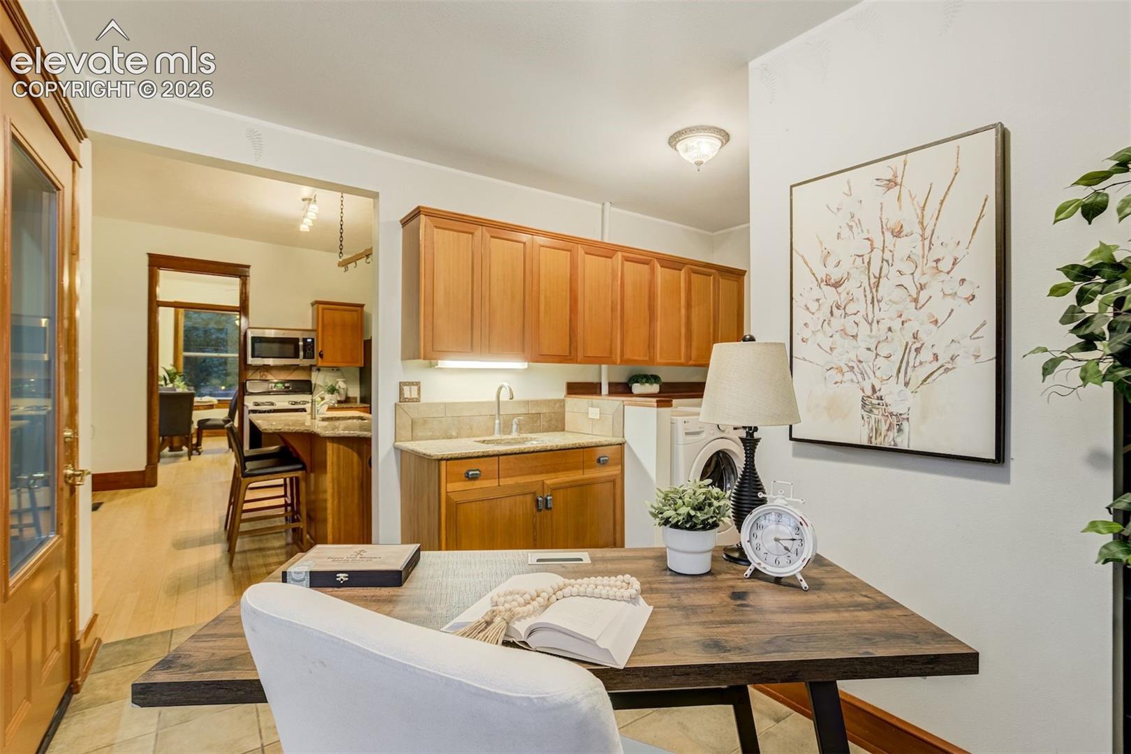 The office nook could also be an eating nook or reading room