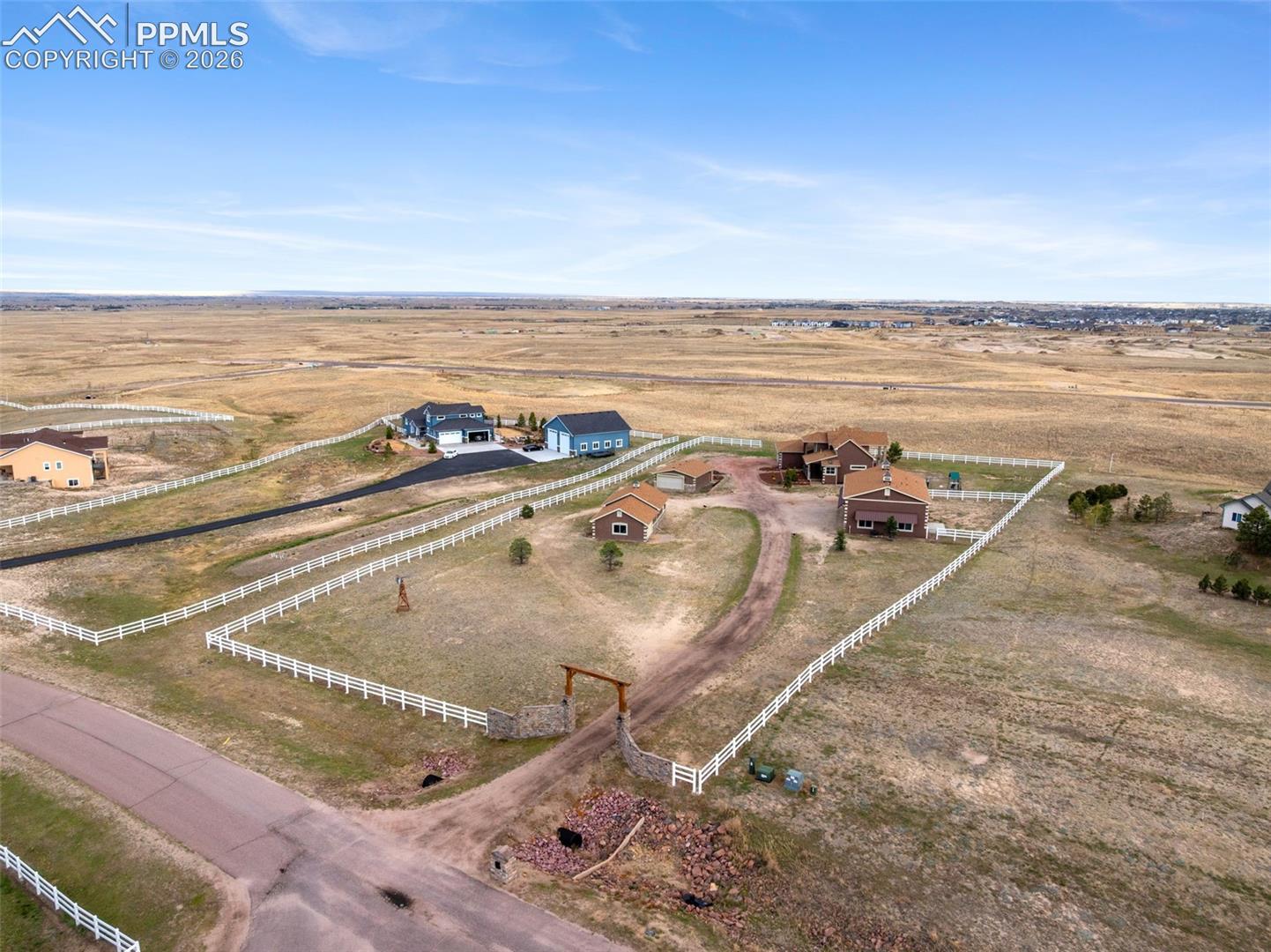 Colorado living - 2.5 acres, 4 buildings, fenced, and a windmill!